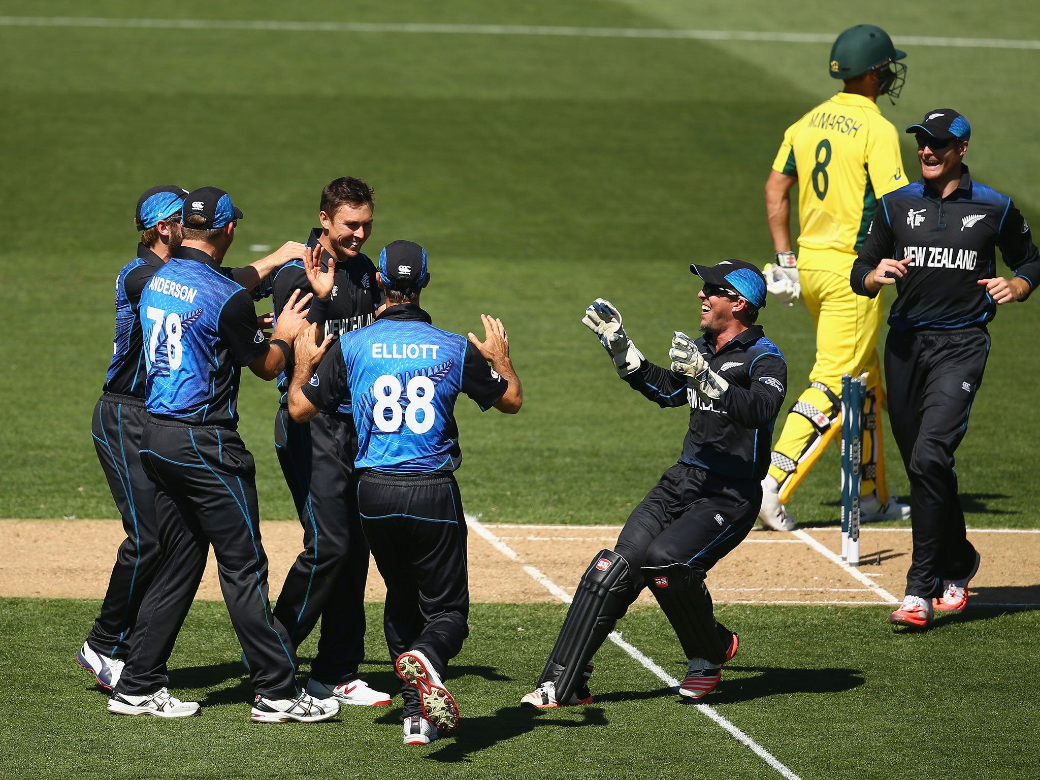 Trent Boult celebrates taking the wicket of Mitchell Marsh