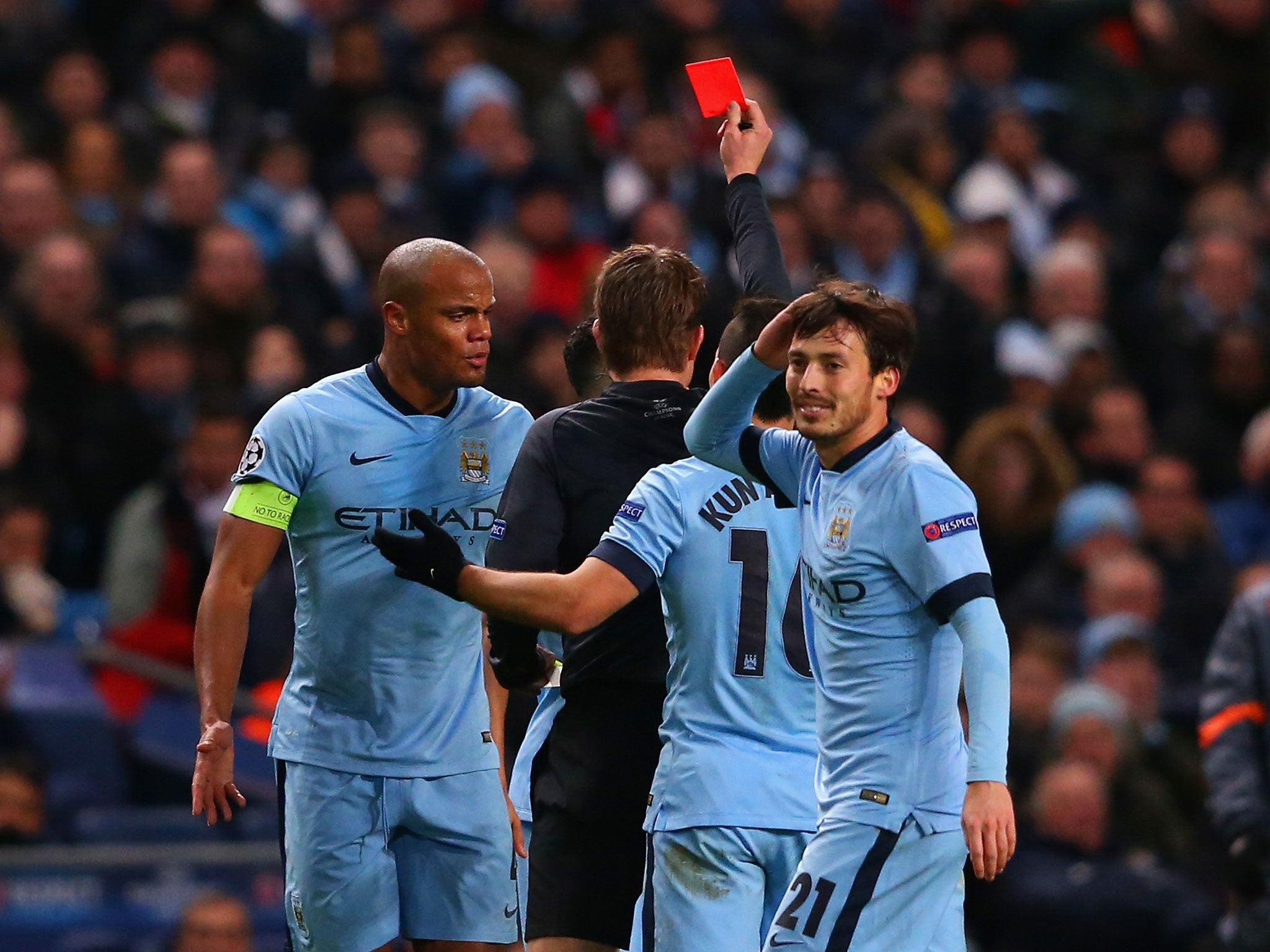 Kompany reacts after Gael Clichy is sent-off