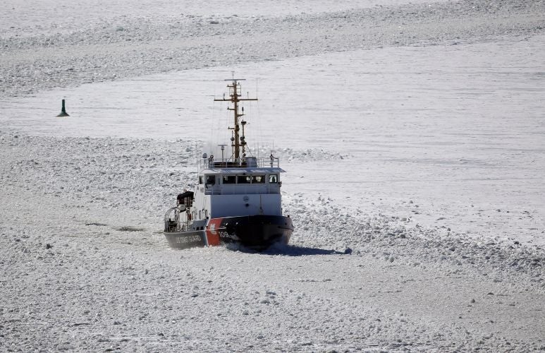 The U.S. Coast Guard cutter Sturgeon Bay breaks ice in the shipping channel on the Hudson River