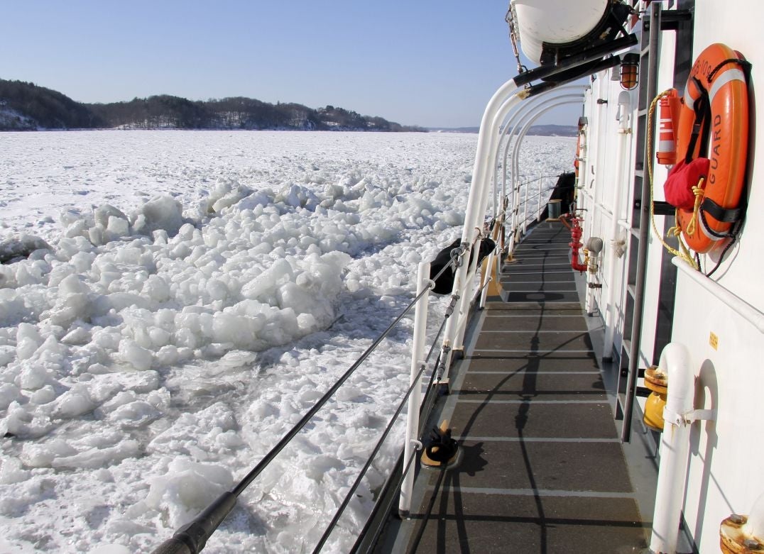 The U.S. Coast Guard cutter Sturgeon Bay breaks ice in the shipping channel on the Hudson River in New York state