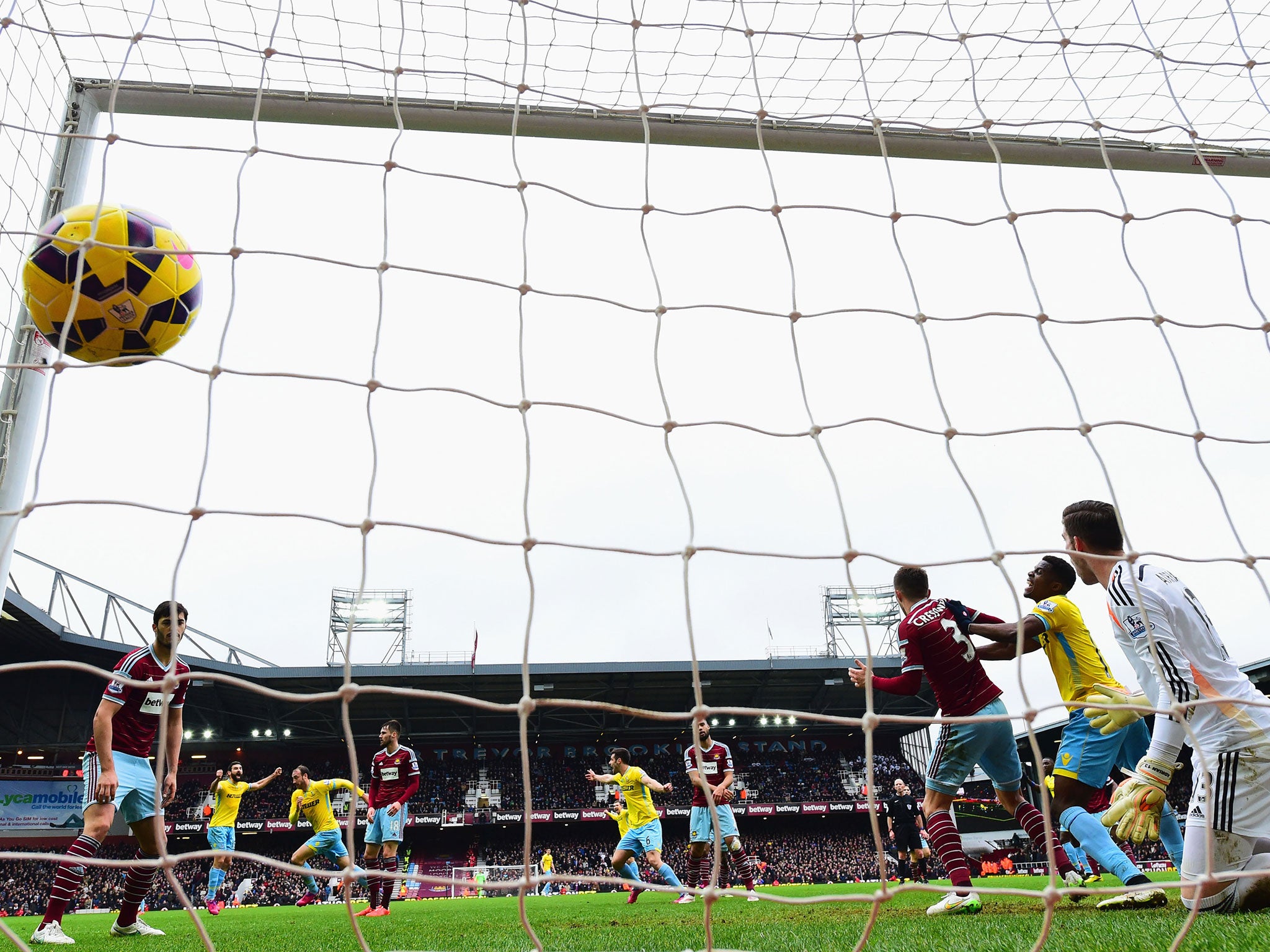 Glenn Murray's header is deflected into the net by Aaron Cresswell