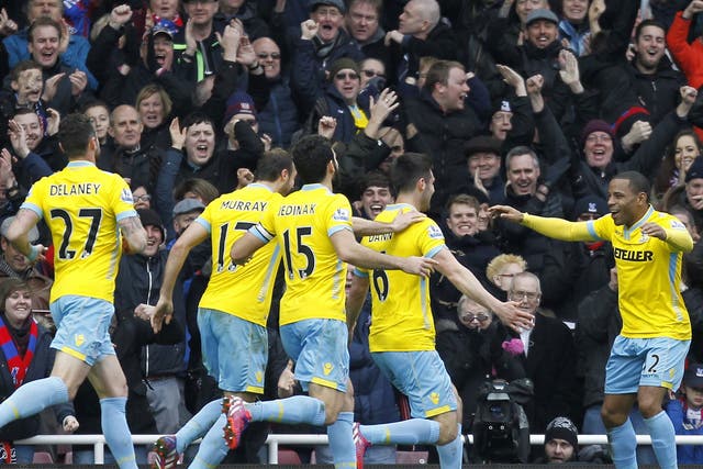 Jason Puncheon celebrates with his teammates as Palace take a 2-0 lead 