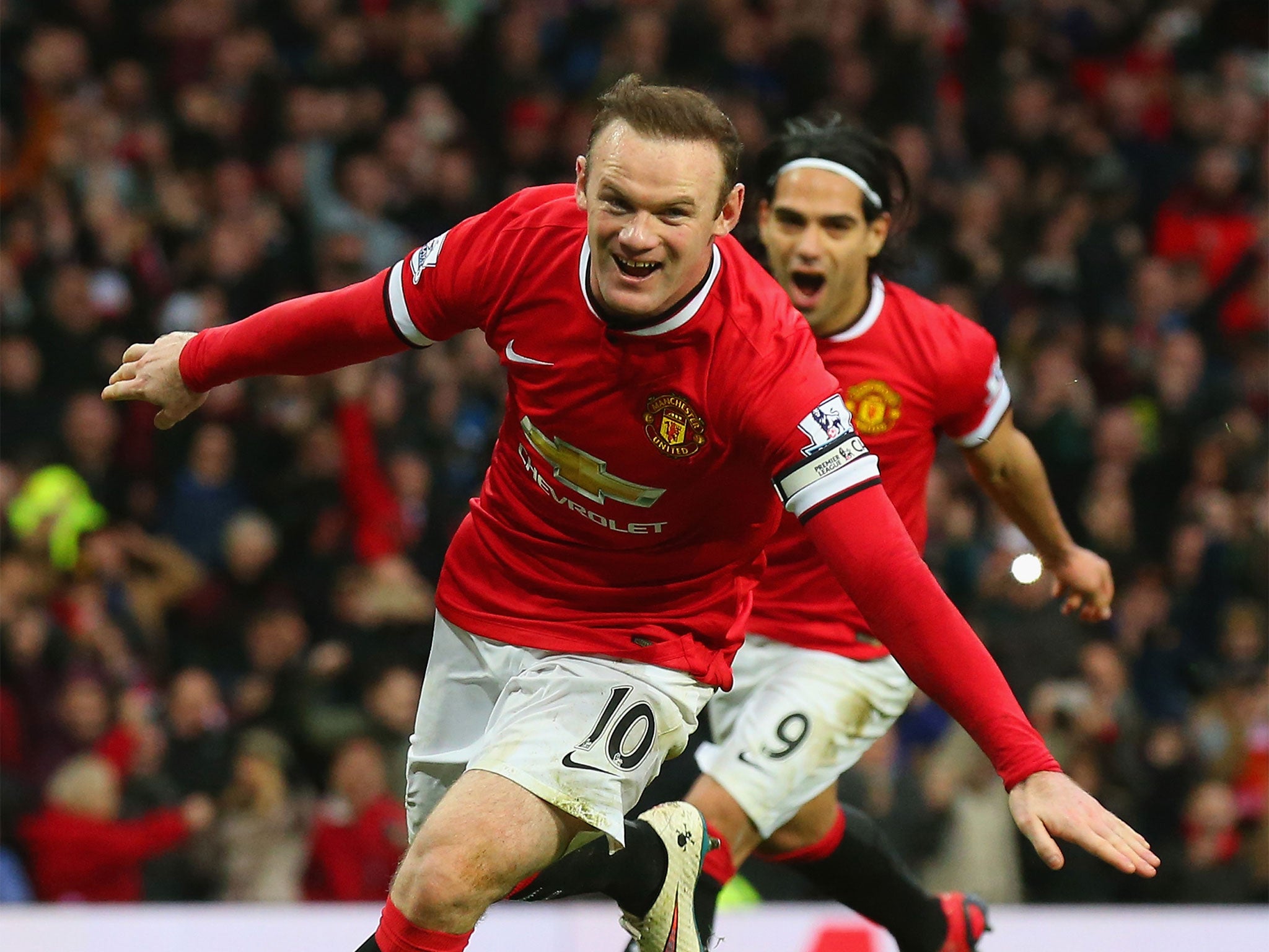 Wayne Rooney celebrates his second goal