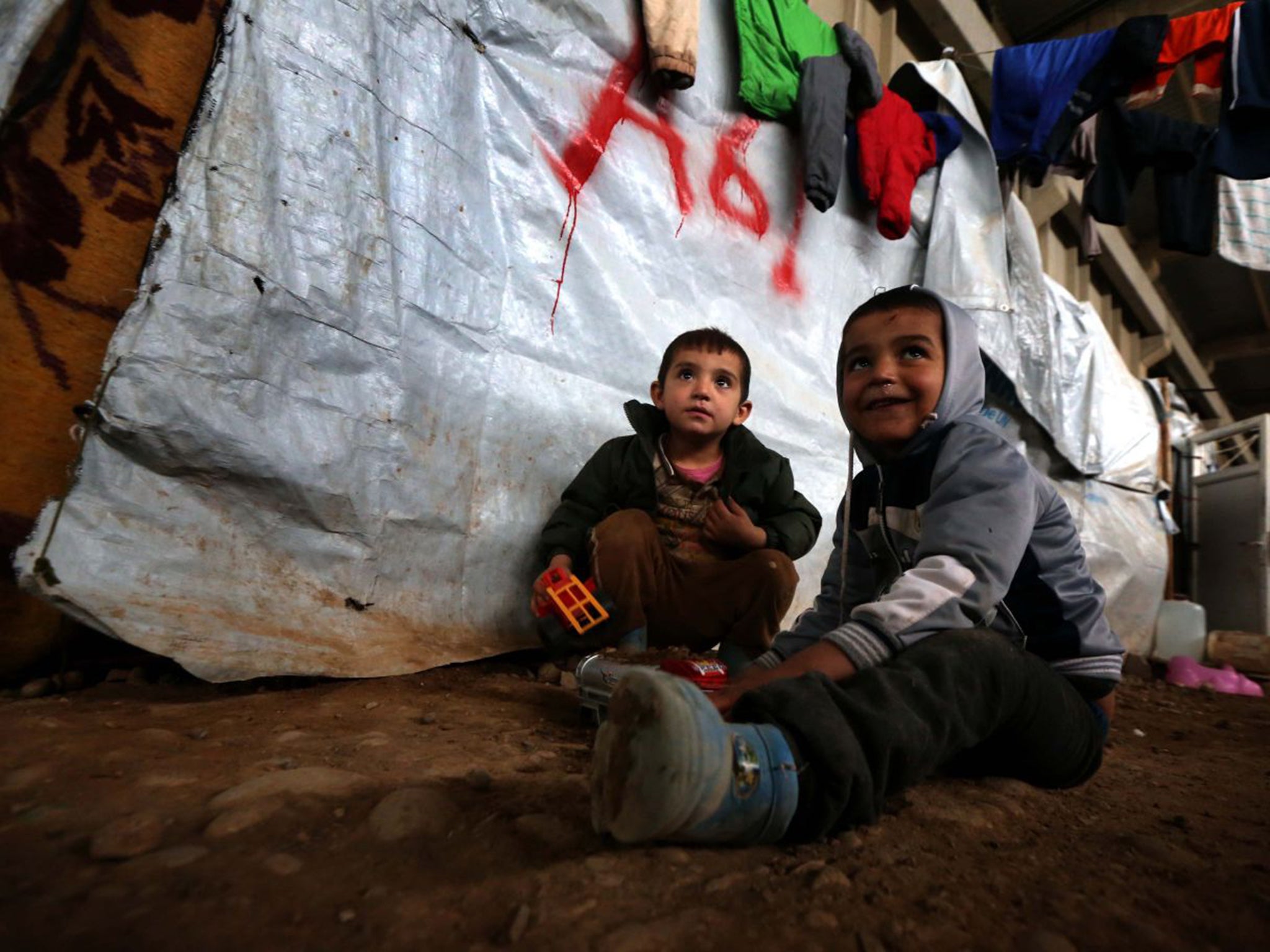 Boys who fled Mosul at a camp near Irbil