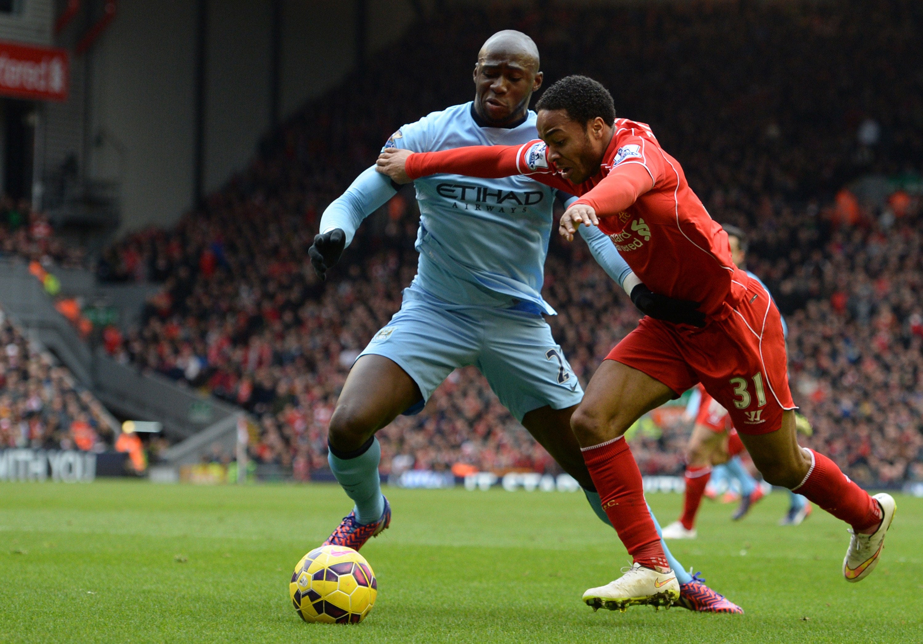 Eliaquim Mangala tussles with Raheem Sterling during the recent 2-1 win for Liverpool