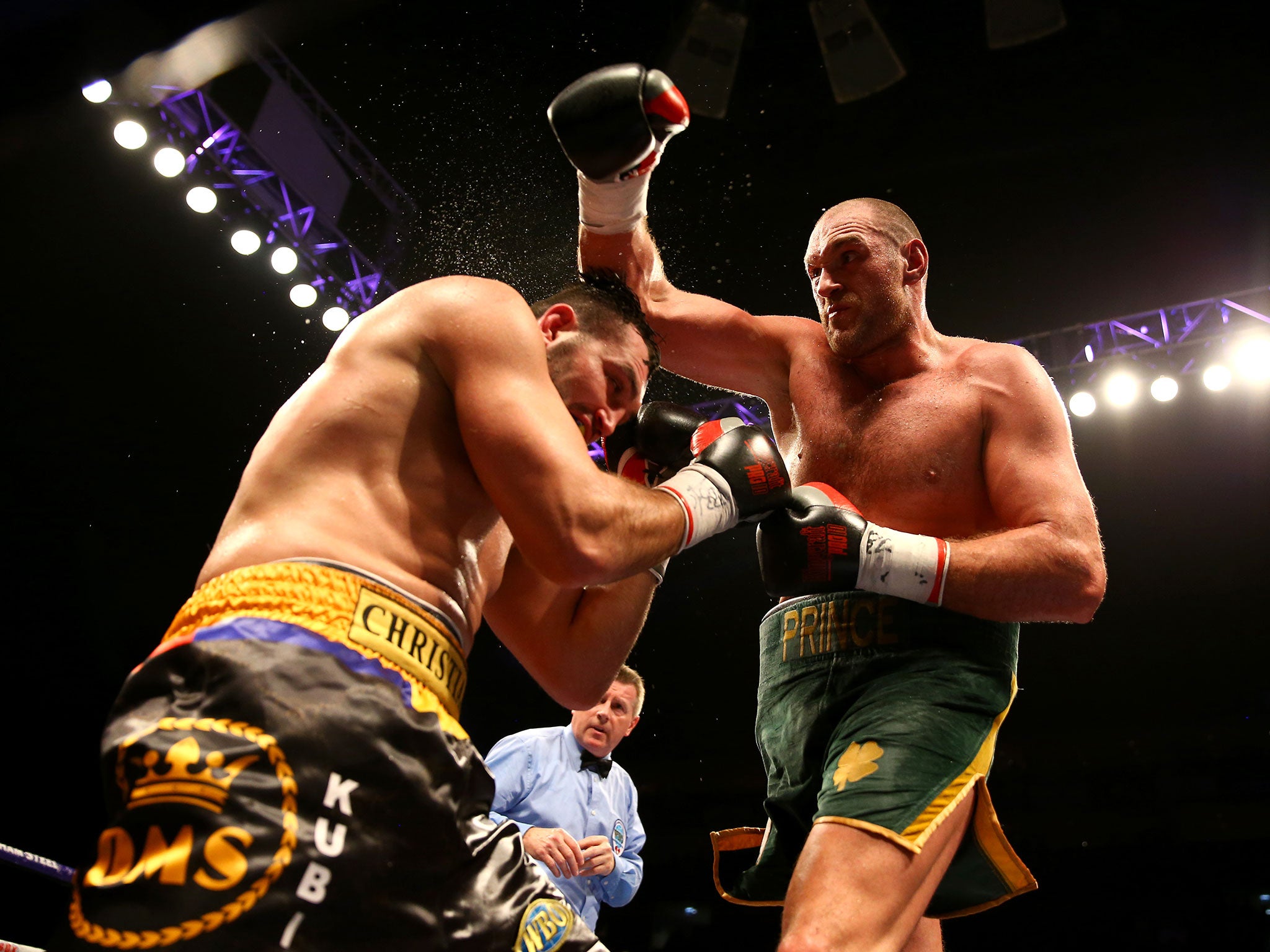 Tyson Fury (right) lands a blow on Christian Hammer