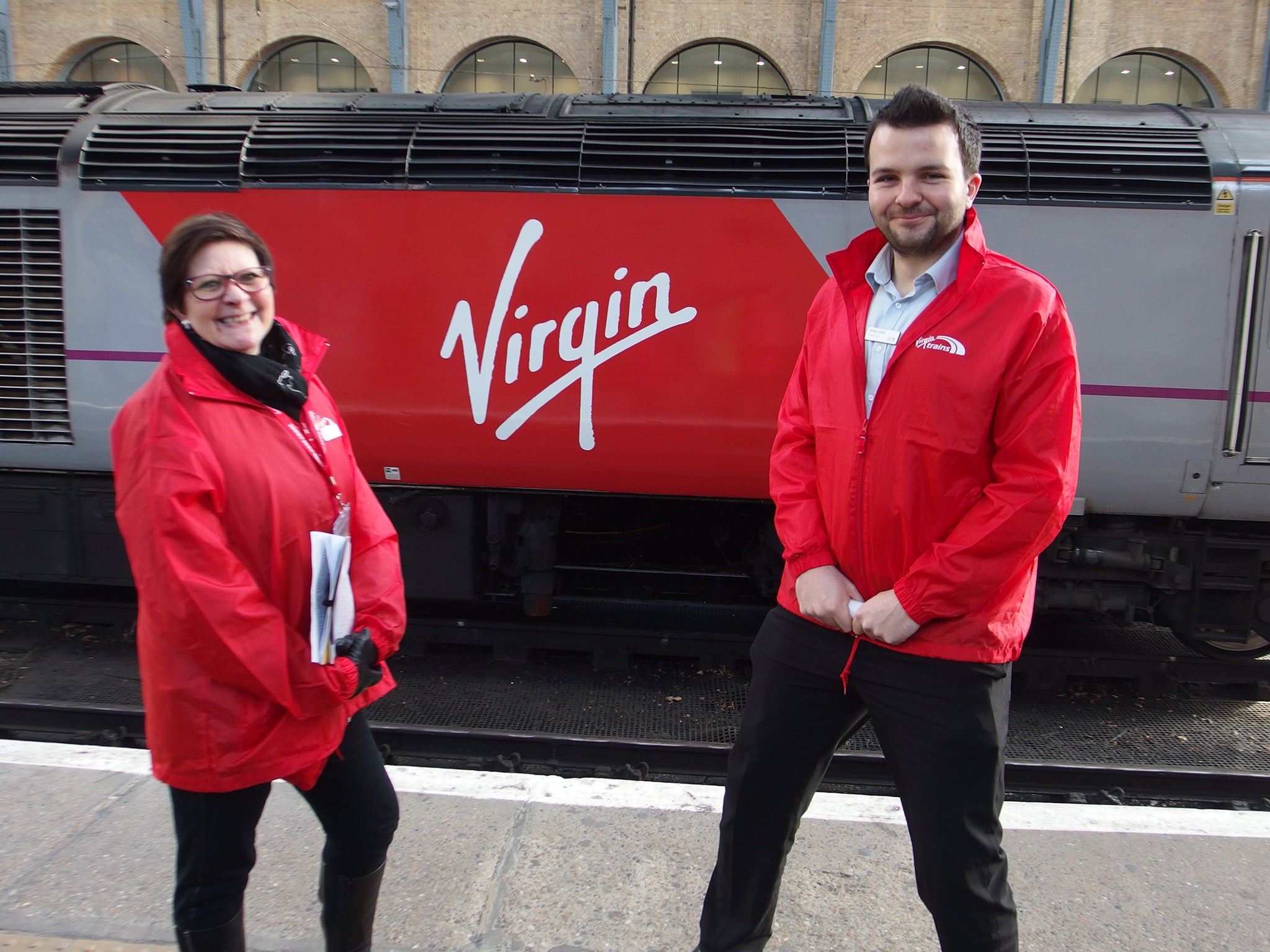 Virgin staff by the first train