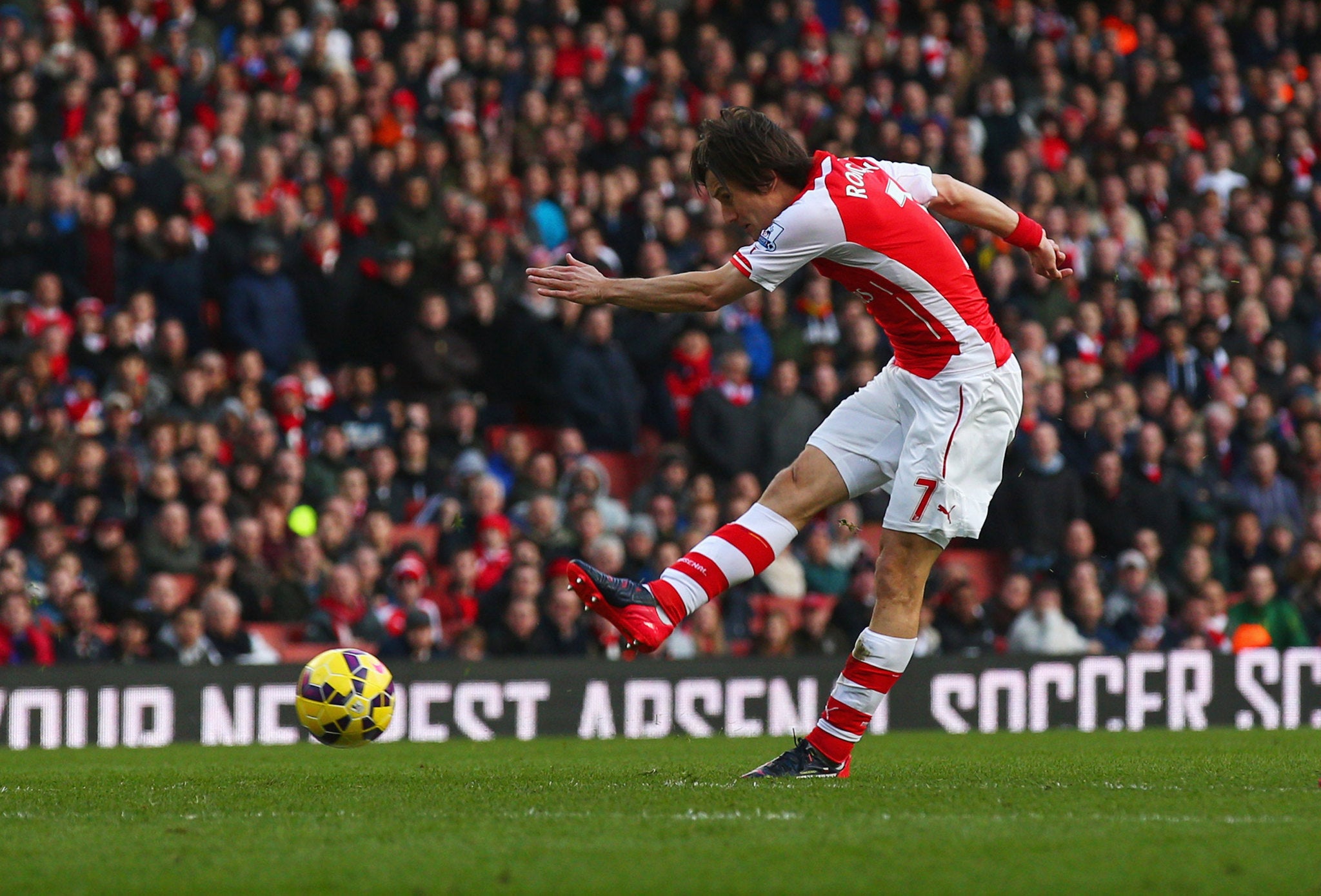 Tomas Rosicky seals the win with a deflected strike