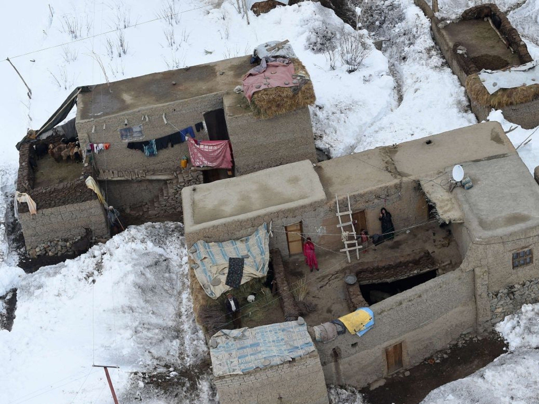 A few of the remaining homes out of the ones that have been damaged or destroyed by avalanches in Afghanistan