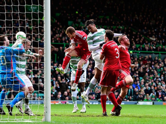 Jason Denayer heads Celtic's opener against Aberdeen