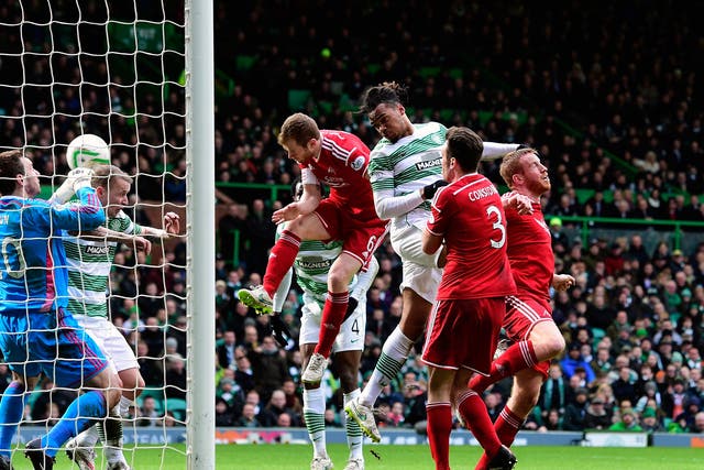 Jason Denayer heads Celtic's opener against Aberdeen