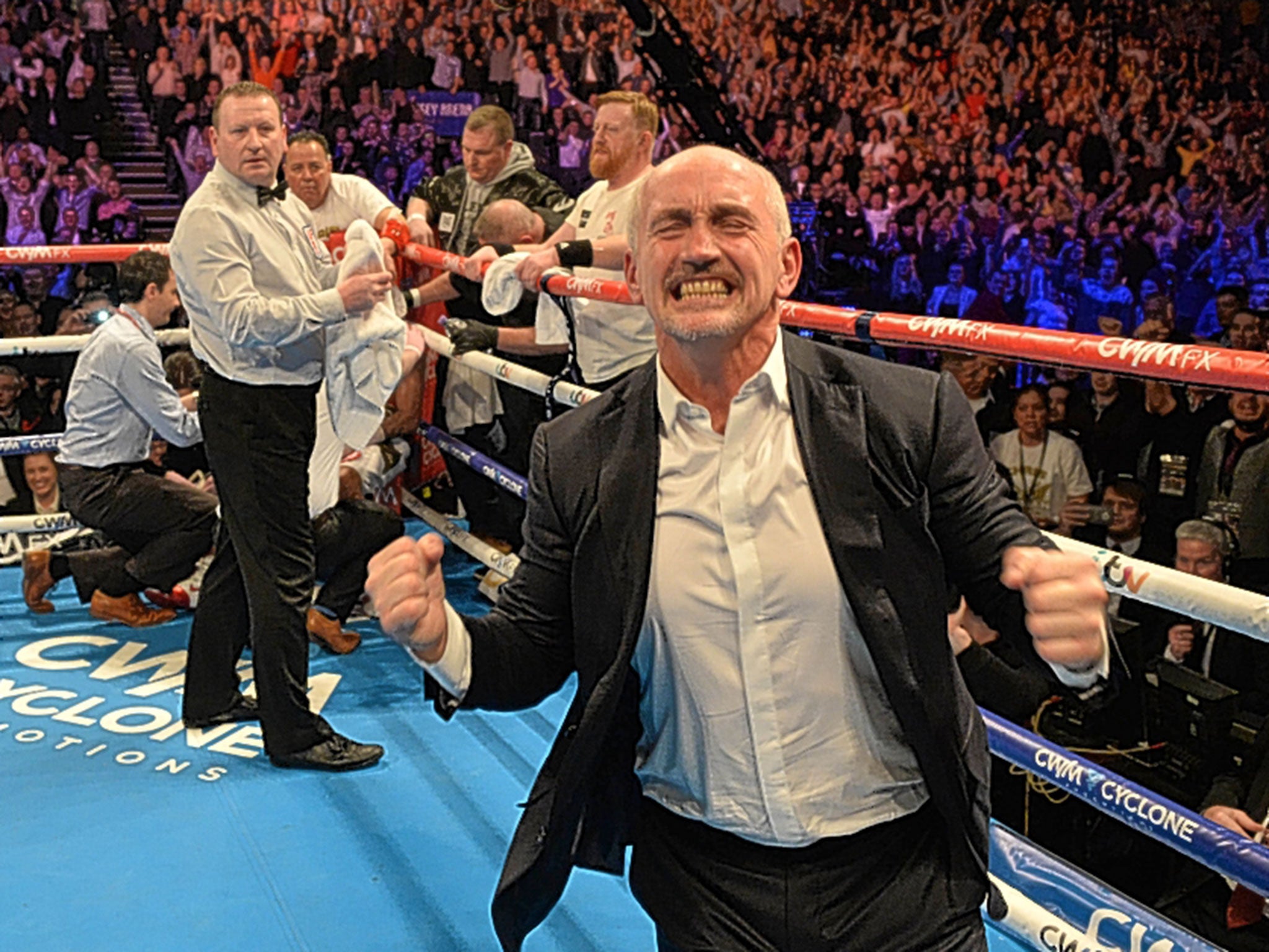 A triumphant Barry McGuigan after the fight was stopped