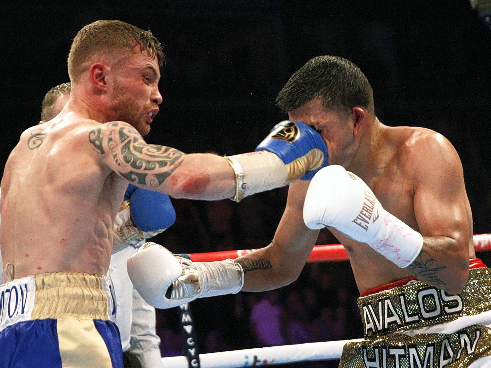 Carl Frampton lands a blow full in the face of Chris Avalos