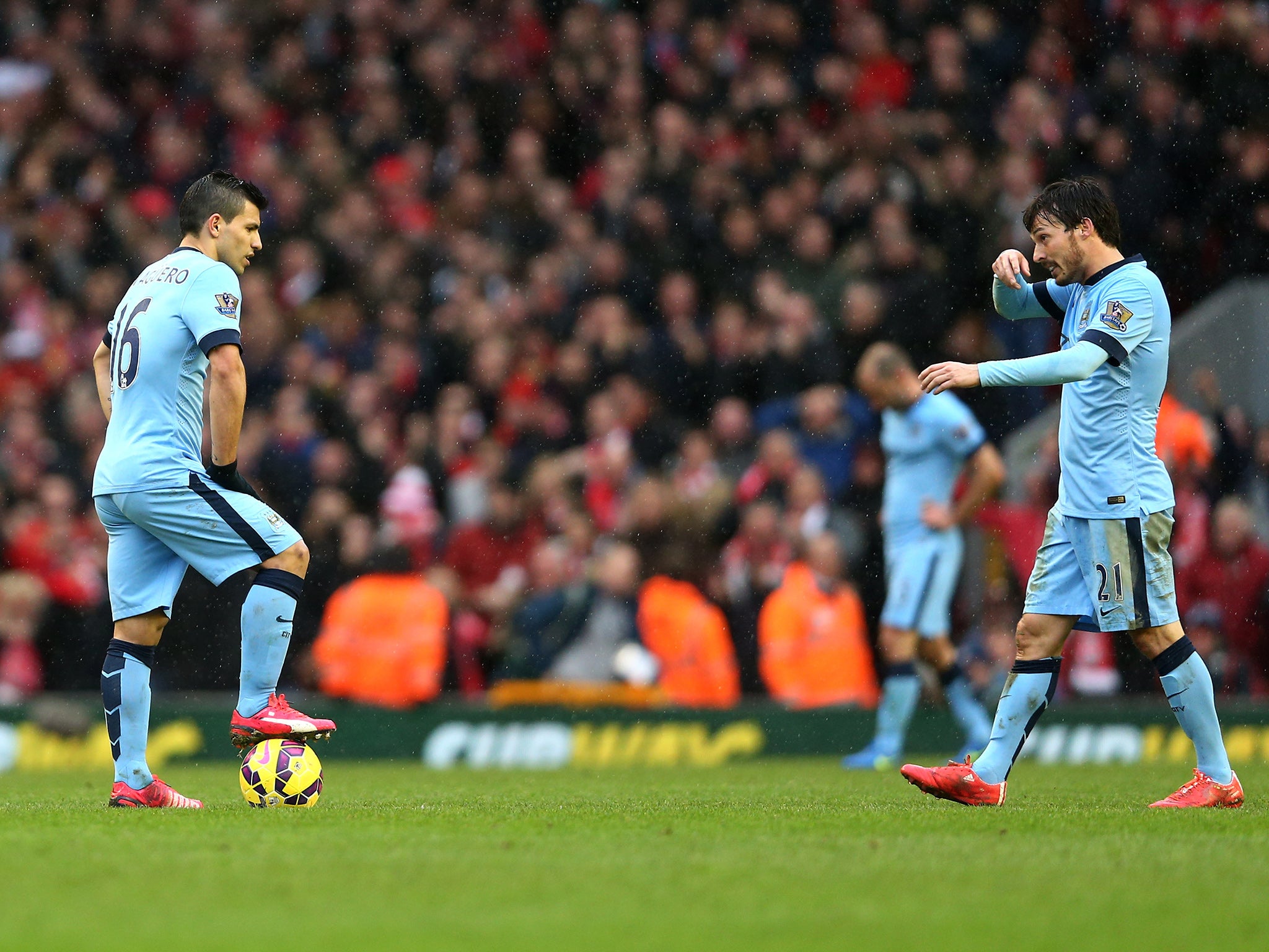 Sergio Aguero and David Silva react to defeat at Anfield