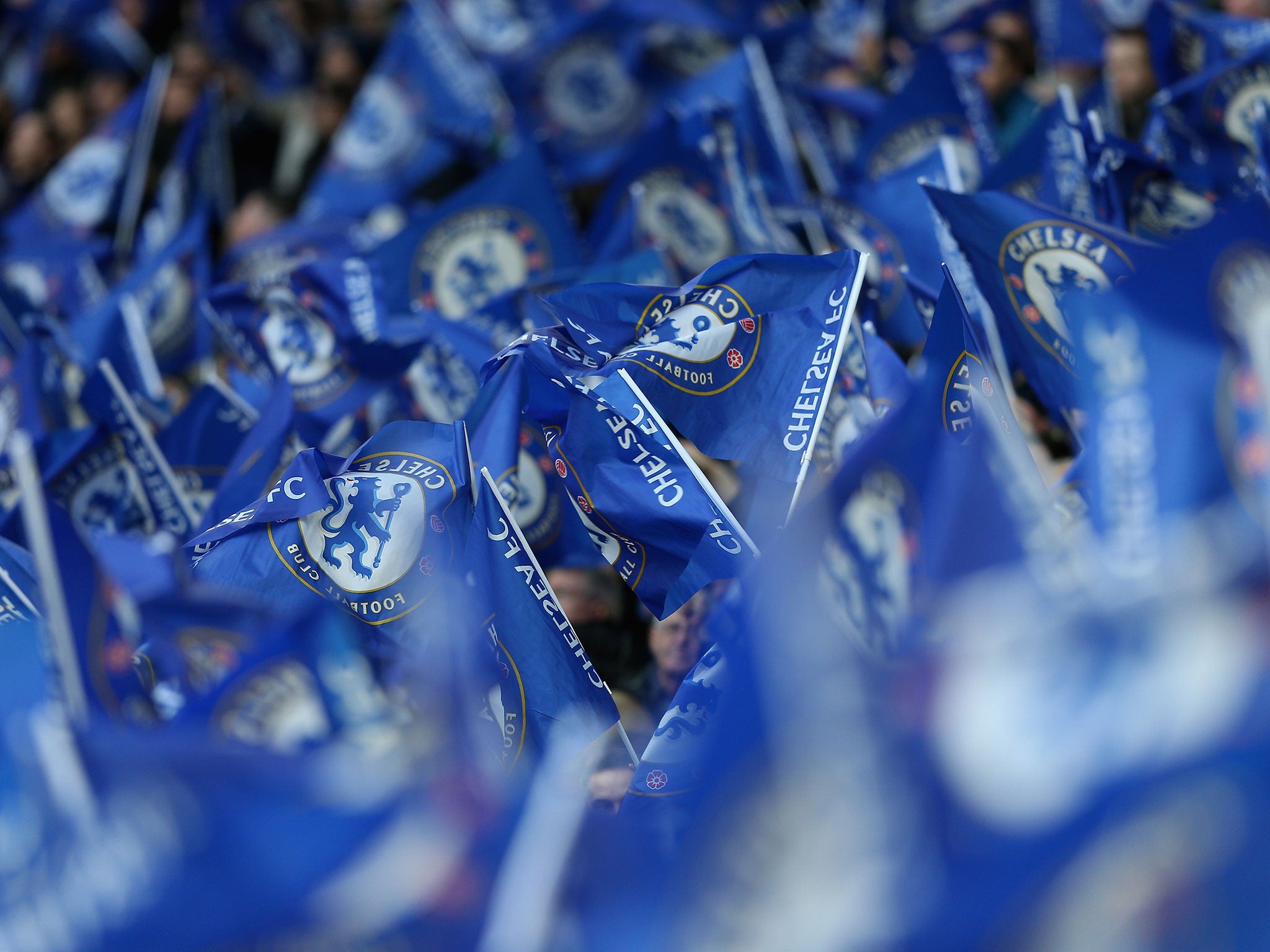 Chelsea fans wave flags before kick-off at Wembley
