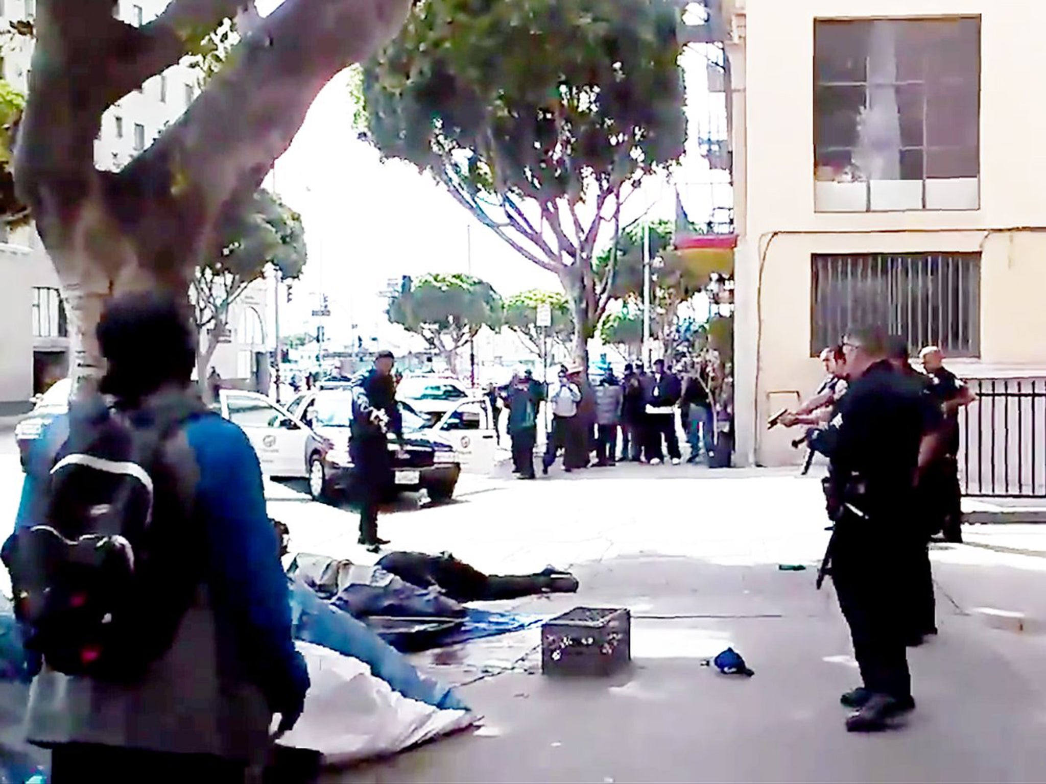 The moment a homeless man was shot dead by Los Angeles police officers was caught on camera