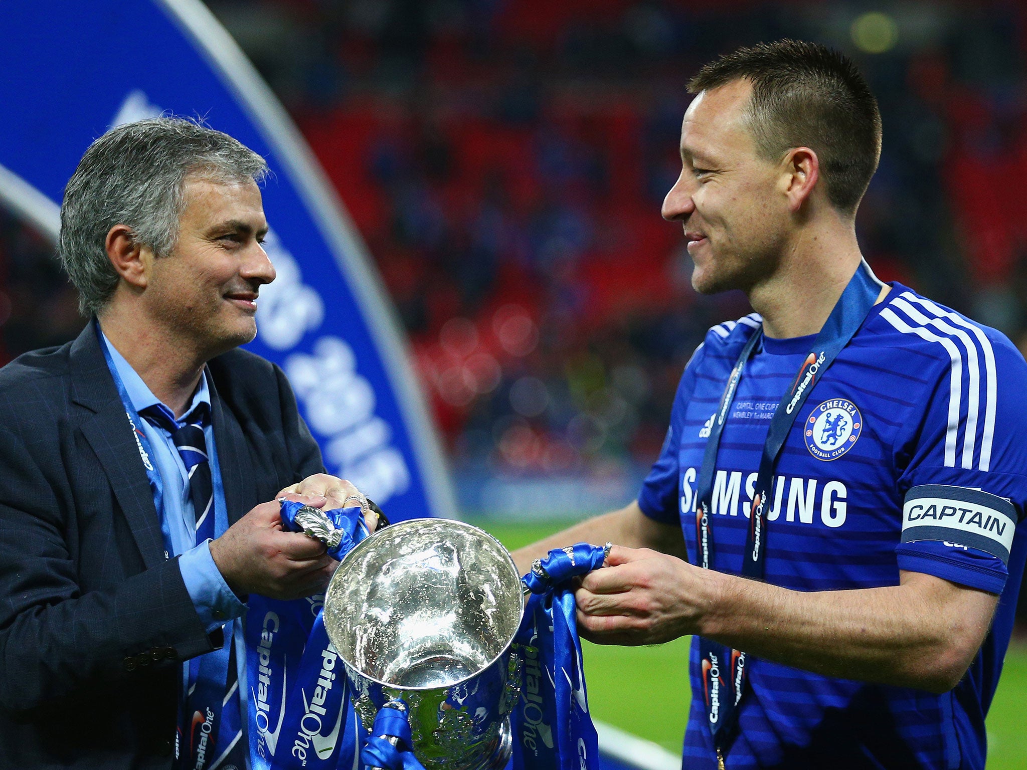 Jose Mourinho and John Terry celebrate with the Capital One Cup on Sunday