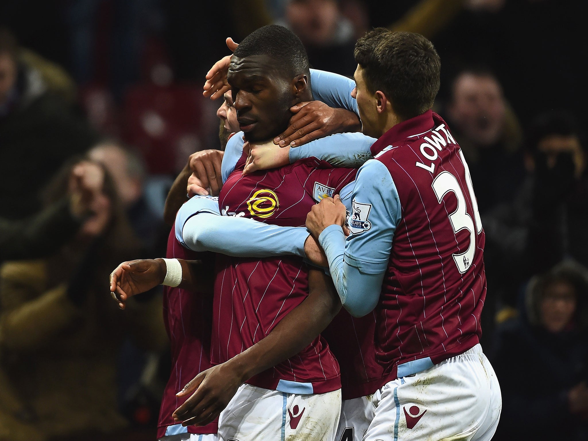 Christian Benteke of Aston Villa celebrates scoring the winner for Aston Villa