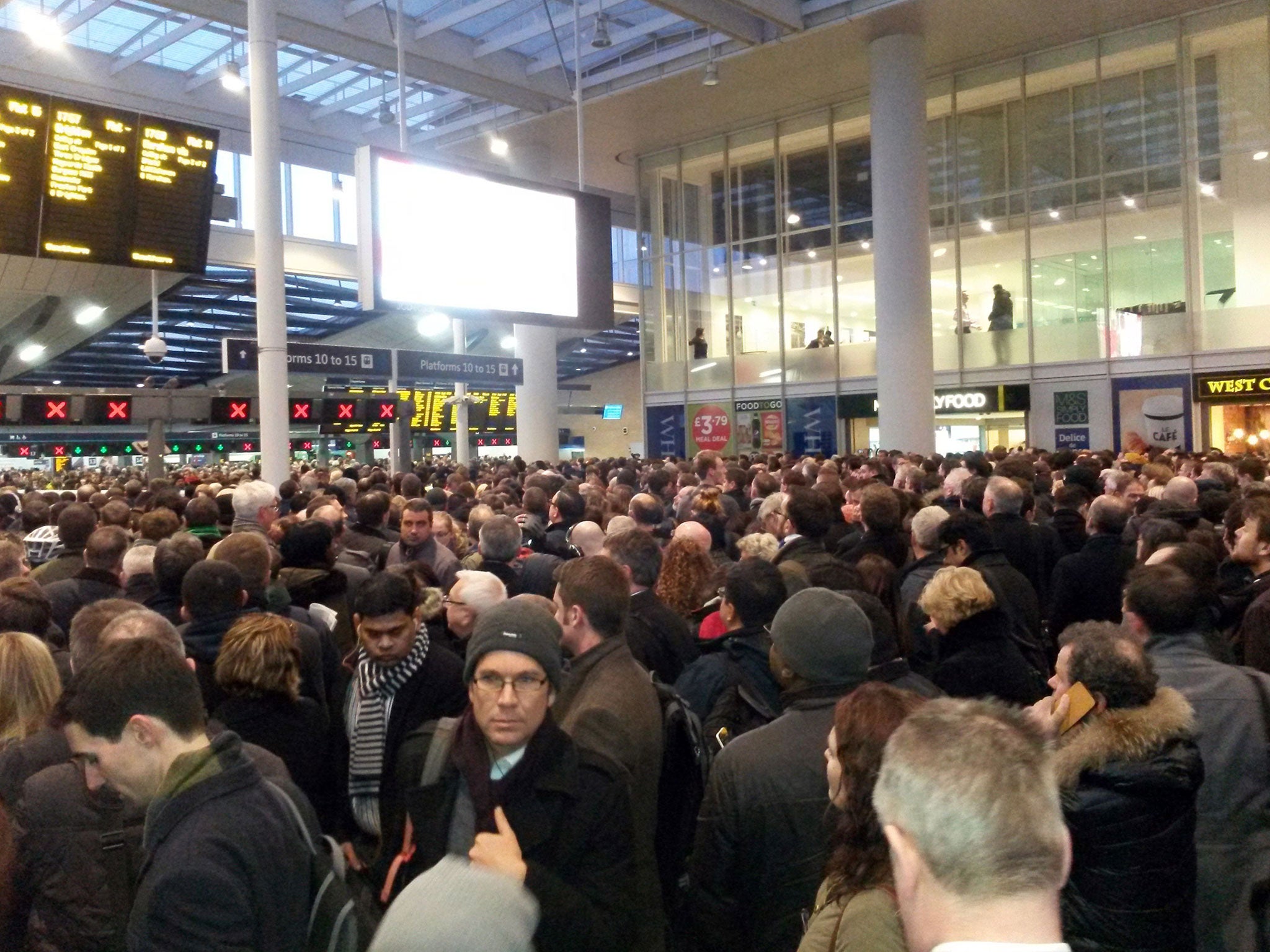 Passengers at London Bridge station as thousands of travellers were left stranded when services ground to a halt during rush hour
