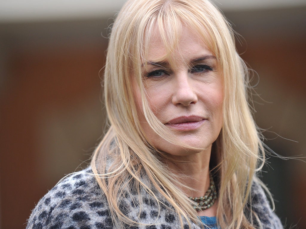Daryl Hannah poses during the photocall on January 23, 2014 in Rome