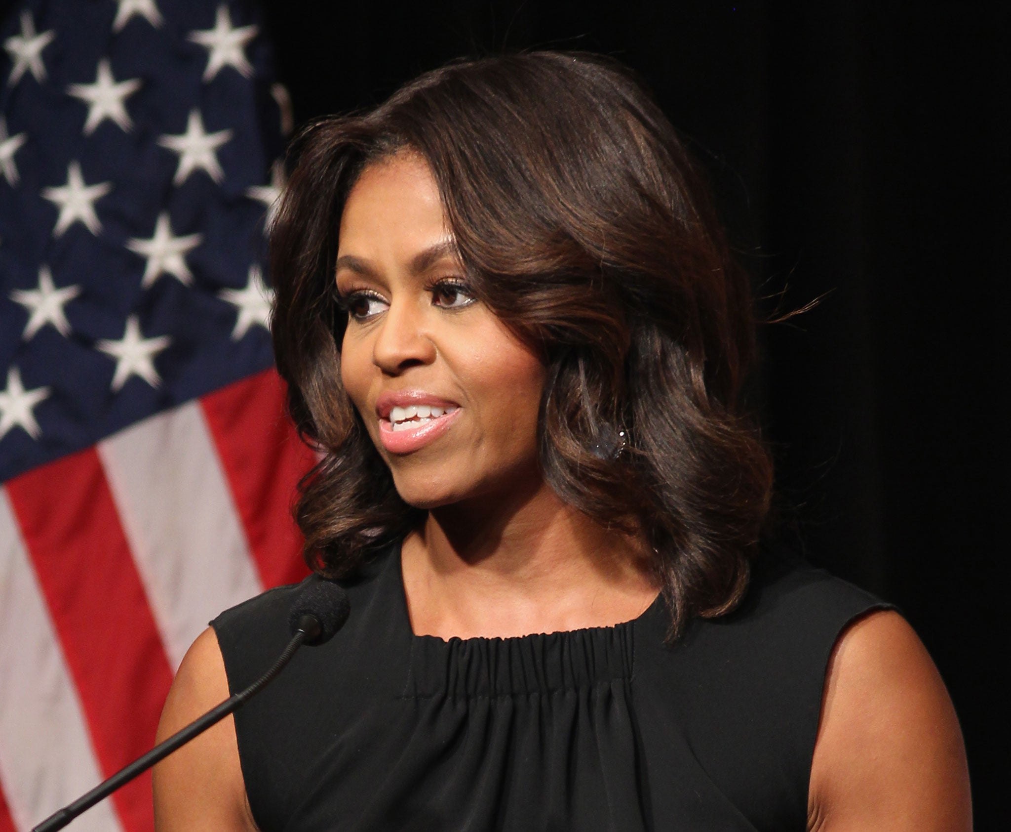Google research's Kevin Murphy explained the challenges of tackling contextual problems such as determining whether the word Obama might refer to Barack, Michele (pictured) or the Japanese city