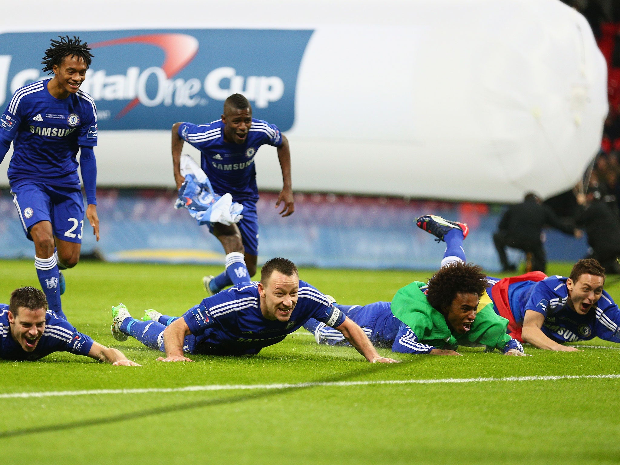 Nemanja Matic (far right) slides across the Wembley turf on Sunday