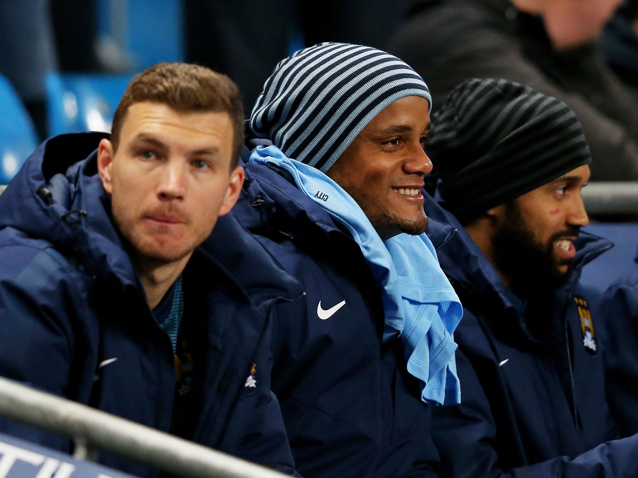 Vincent Kompany looks on from the stands