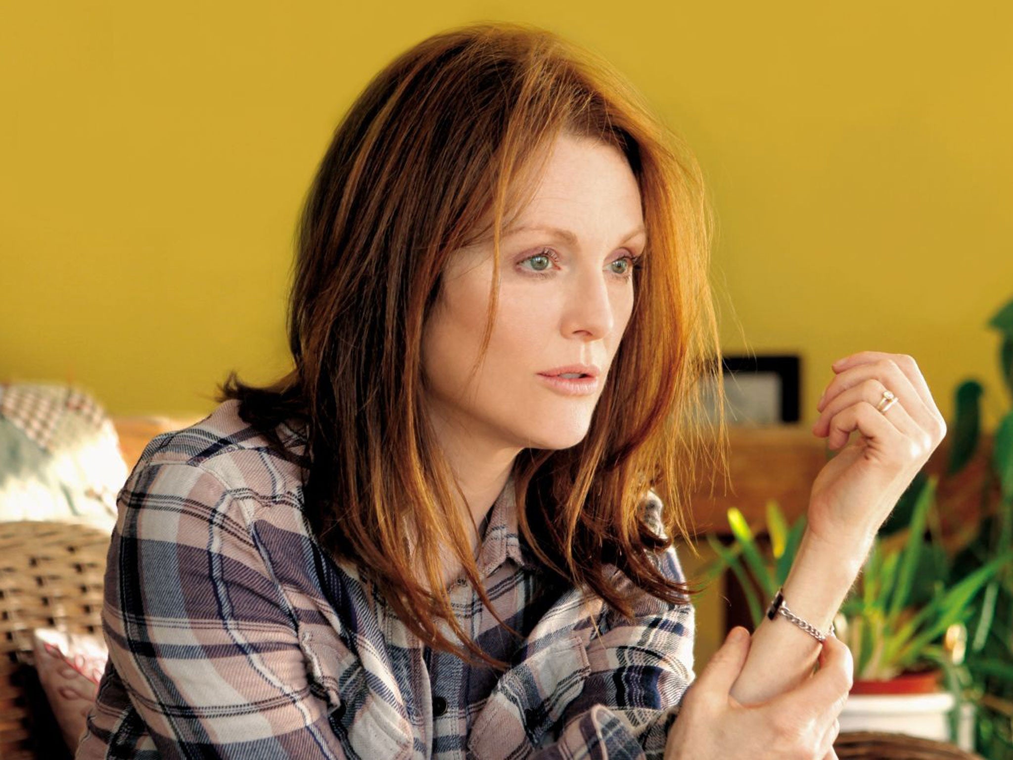 Julianne Moore plays the protagonist in Still Alice, who develops Alzheimer's after getting lost on a jog