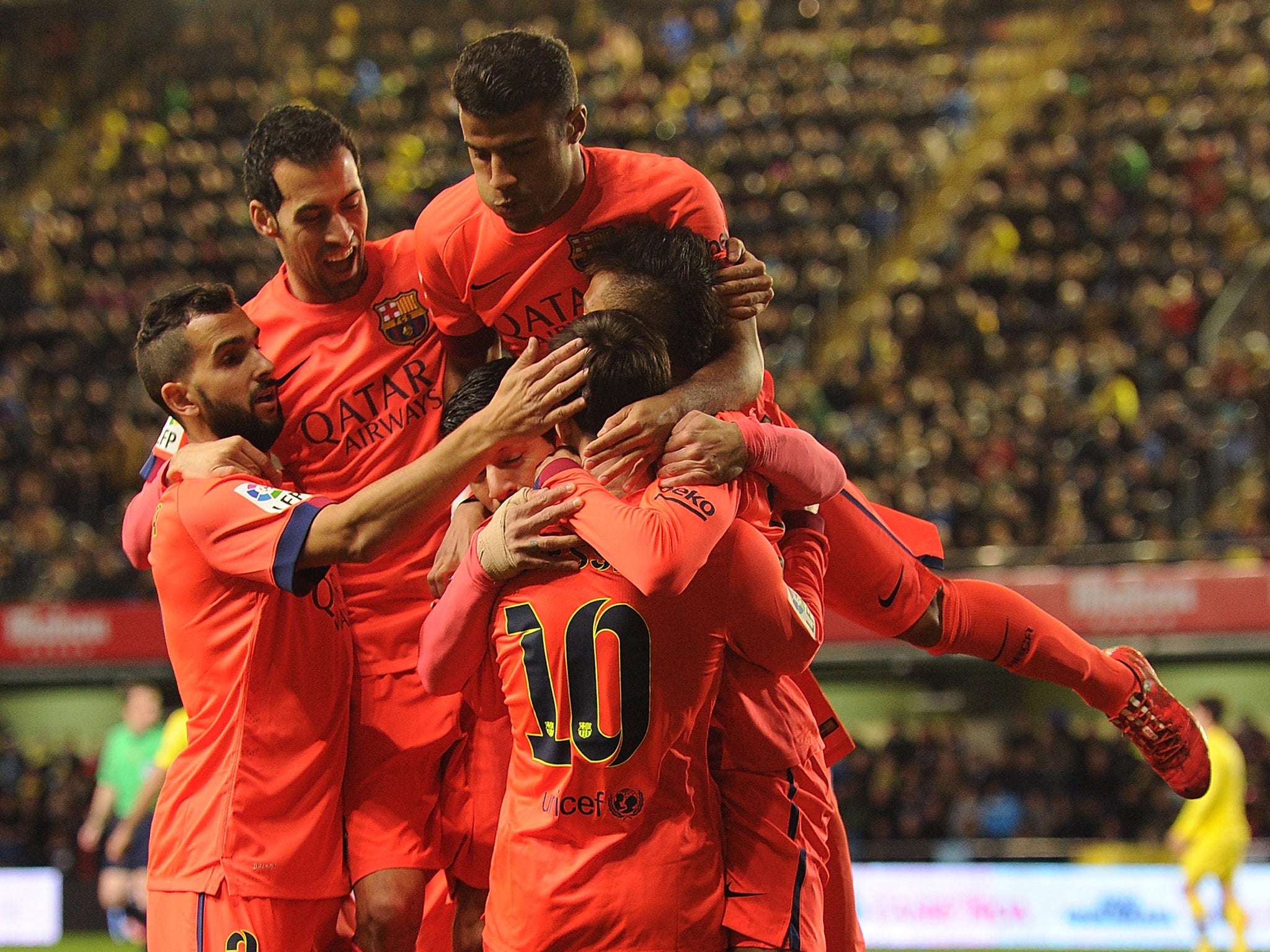 Neymar (R) of Barcelona celebrates with teammates after scoring