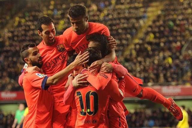 Neymar (R) of Barcelona celebrates with teammates after scoring