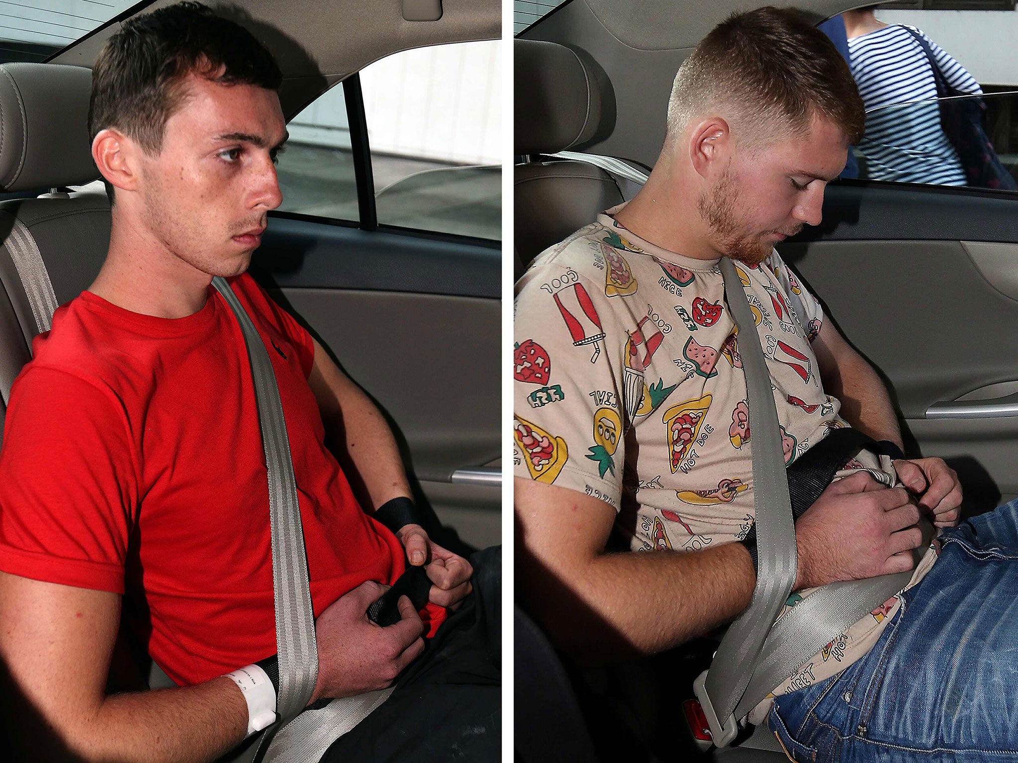 Andreas Von Knorre (L) and Elton Hinz, both charged for vandalising an SMRT train, arriving at the State Court in Singapore 22 November, 2014