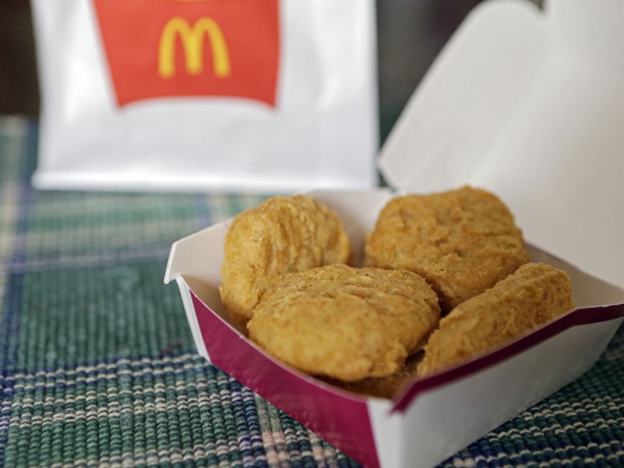 McDonald's says it plans to start using chicken raised without antibiotics important to human medicine and milk from cows that are not treated with the artificial growth hormone rbST.