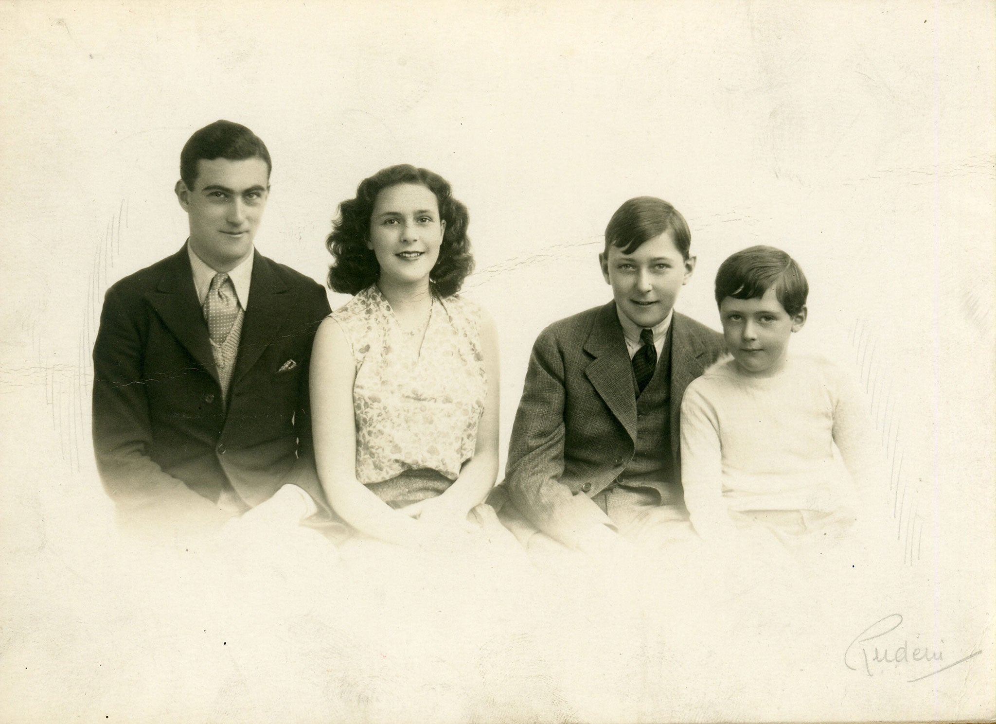 Carrington before she left England with her brothers - from left, Pat, Gerard and Arthur (© Estate of Leonora Carrington)