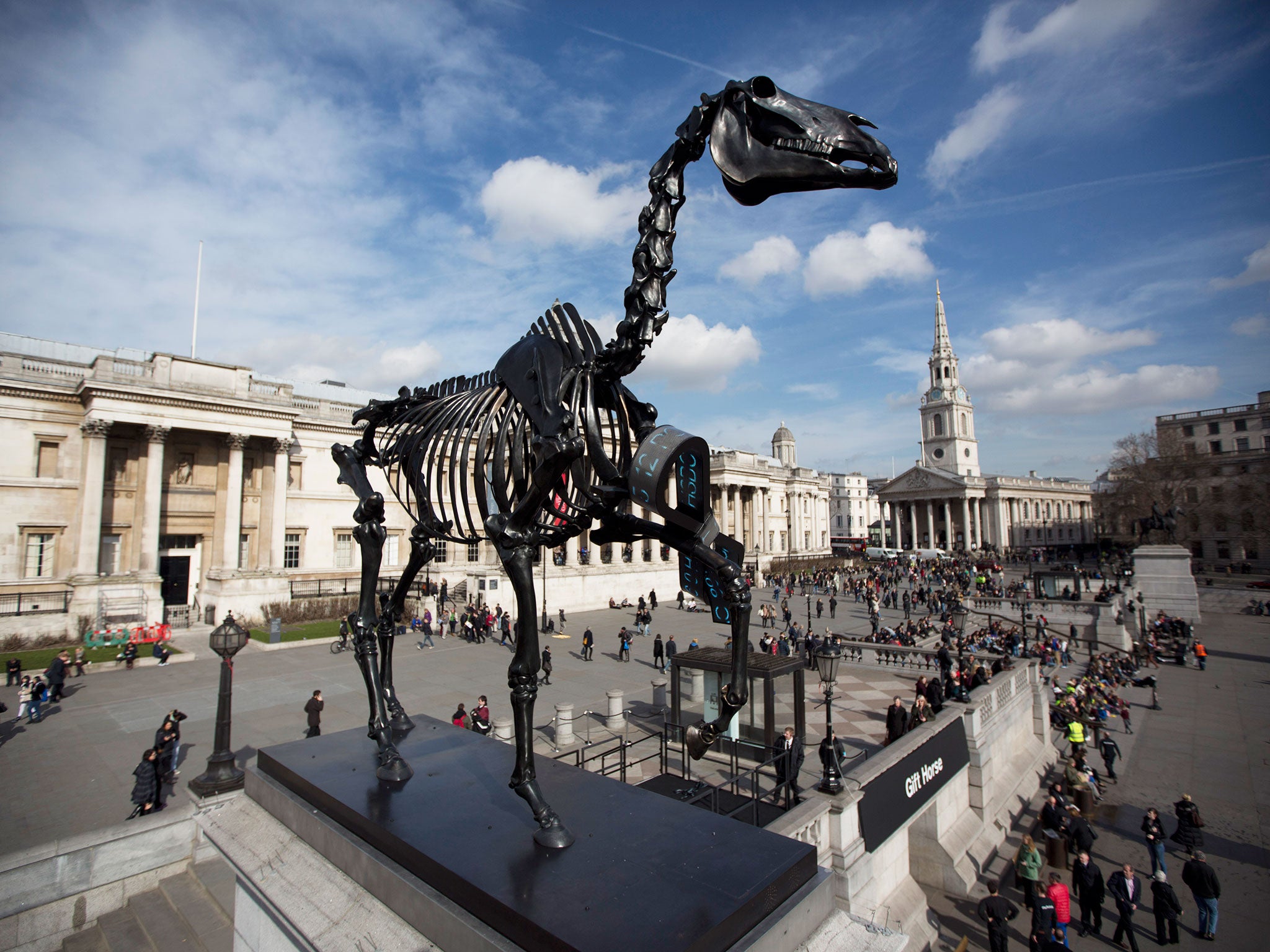 The sculpture "Gift Horse", which portrays a skeletal horse by German-born artist Hans Haacke, stands above Trafalgar Square after it was unveiled as the new commission for the Fourth Plinth, in London