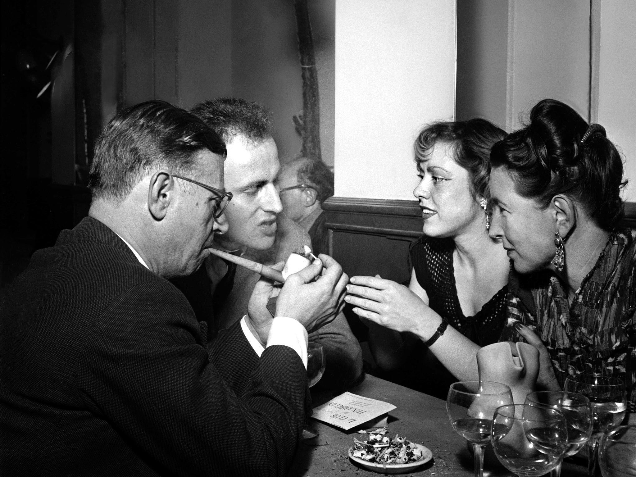 Sparking debate: Boris and Michelle Vian, Jean-Paul Sartre and Simone de Beauvoir in Saint-Germain des Pres, Paris in 1949 (Rex)