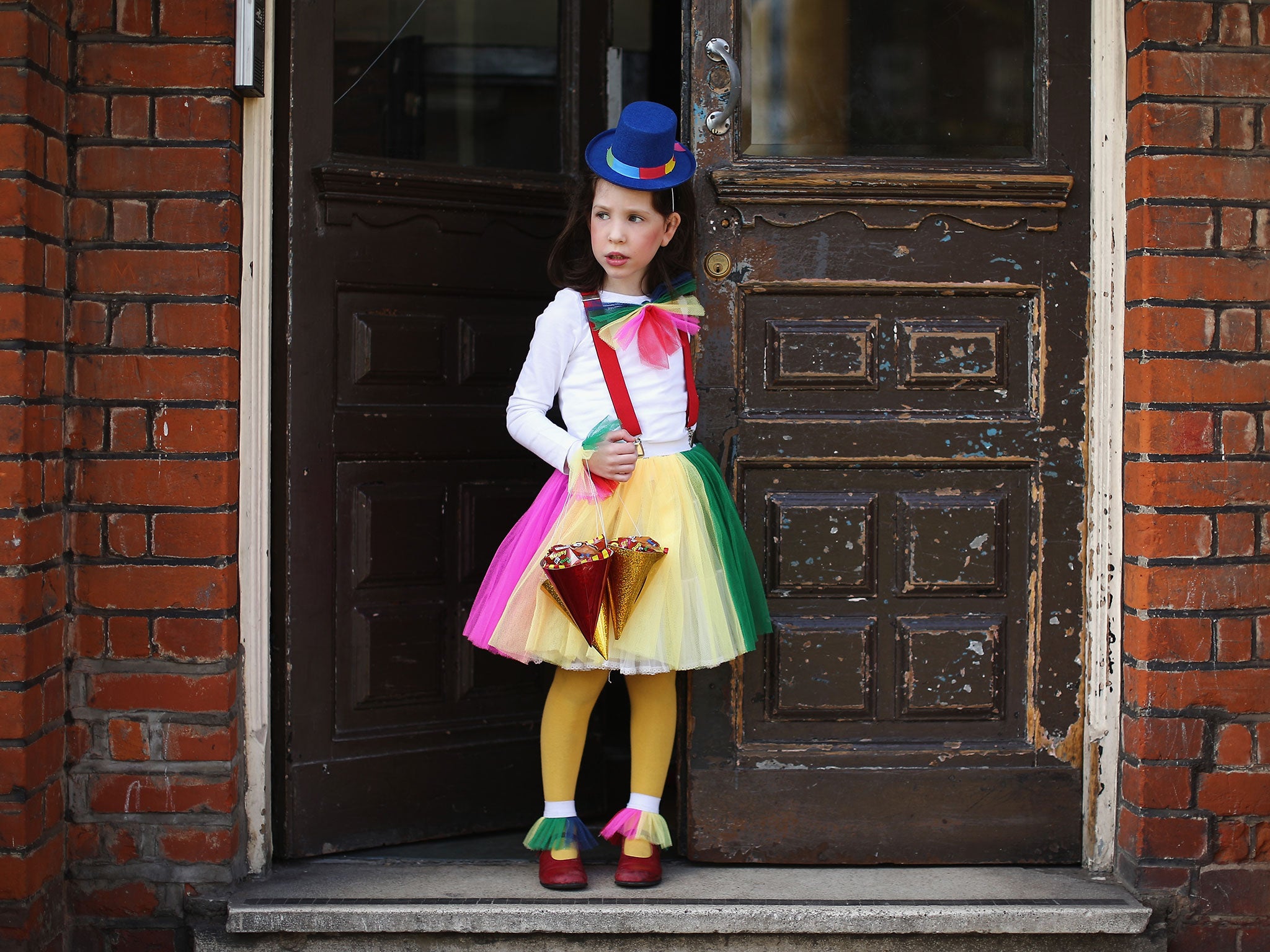 A girl dresses up for Purim (Getting Images)