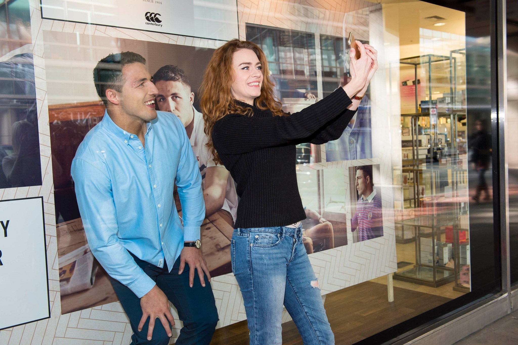 Burgess surprised fans by posing as a live mannequin to launch the Canterbury Since 1904 Collection