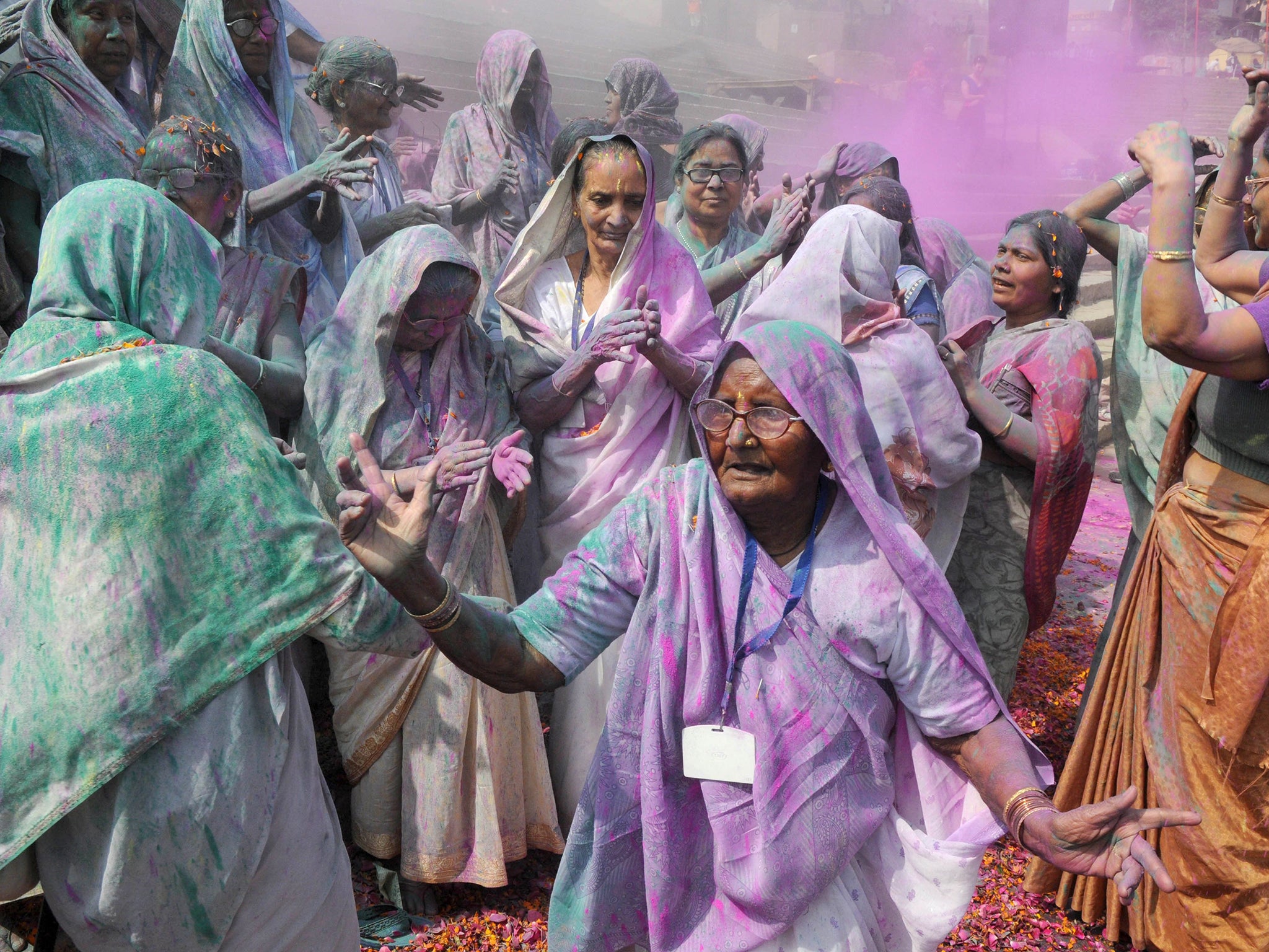 Women take part in the Holi celebrations