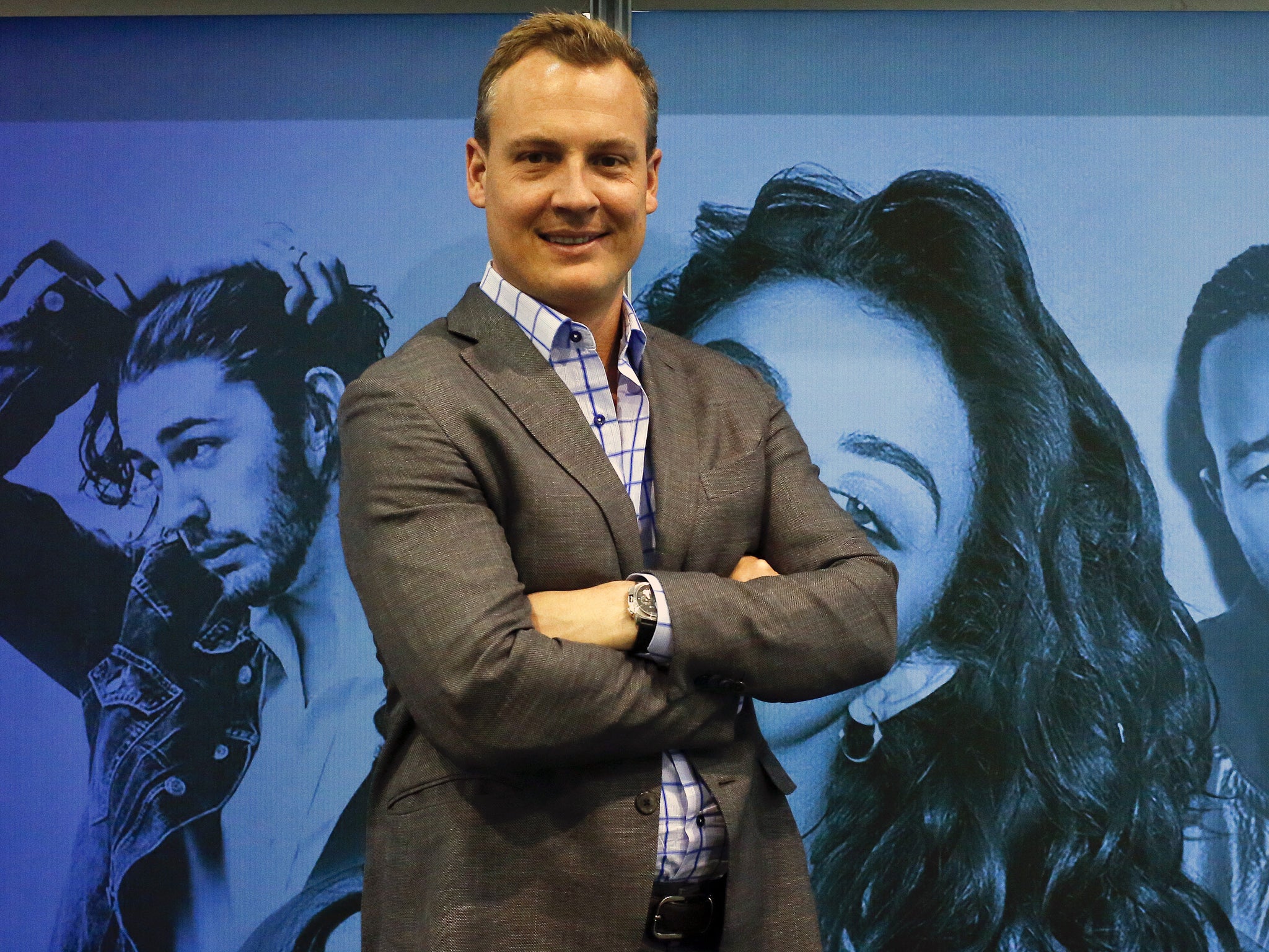 Shazam's Chief Executive Rich Riley poses at the Mobile World Congress in Barcelona March 4, 2015