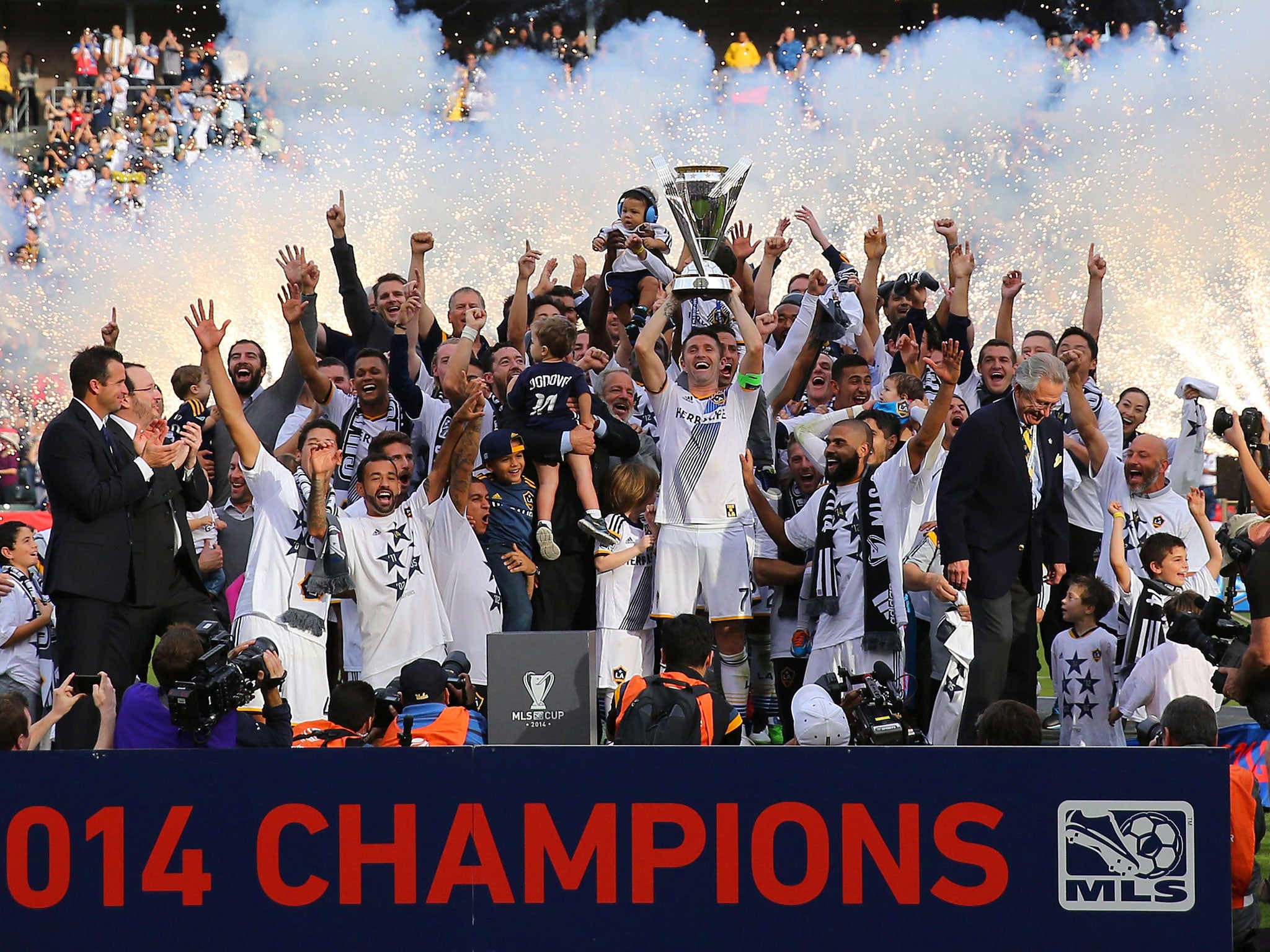 LA Galaxy captain Robbie Keane (with trophy) after winning the MLS Cup final last year