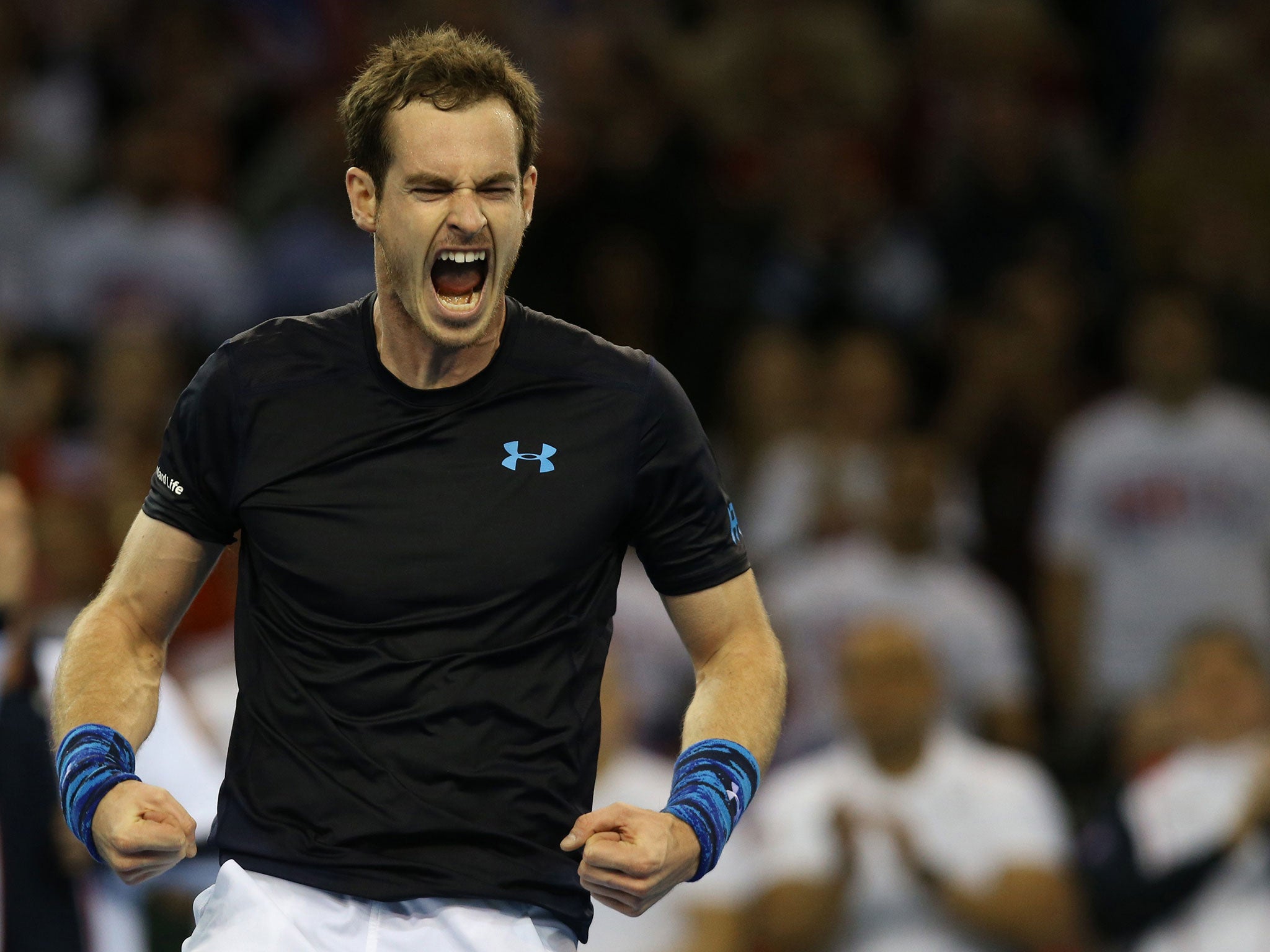 Andy Murray roars after beating Donald Young in the Davis Cup