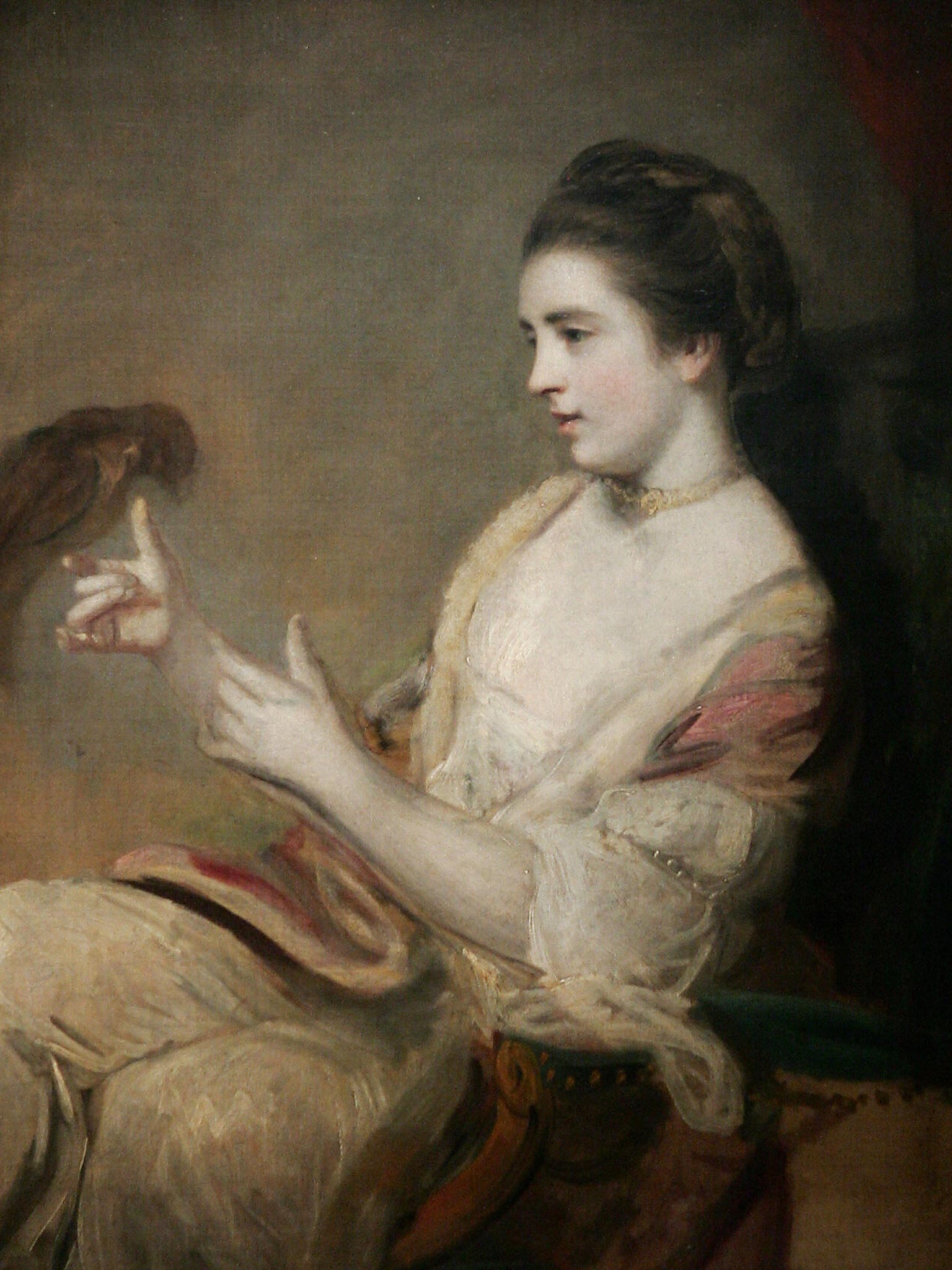 A portrait of Kitty Fisher by Sir Joshua Reynolds, he was experimenting with light and shade in his work