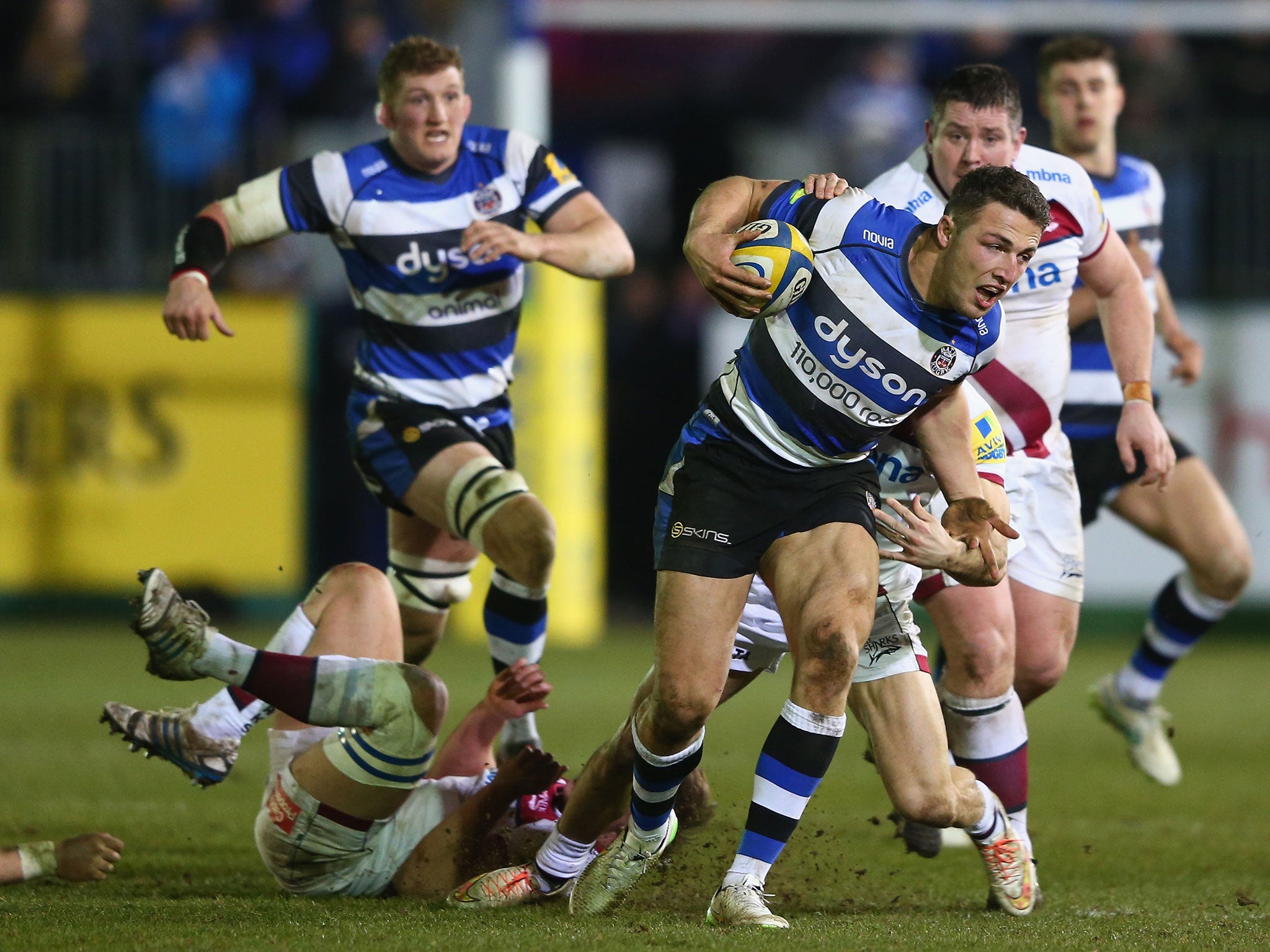 Sam Burgess attempts to break a tackle in Bath's win over Sale