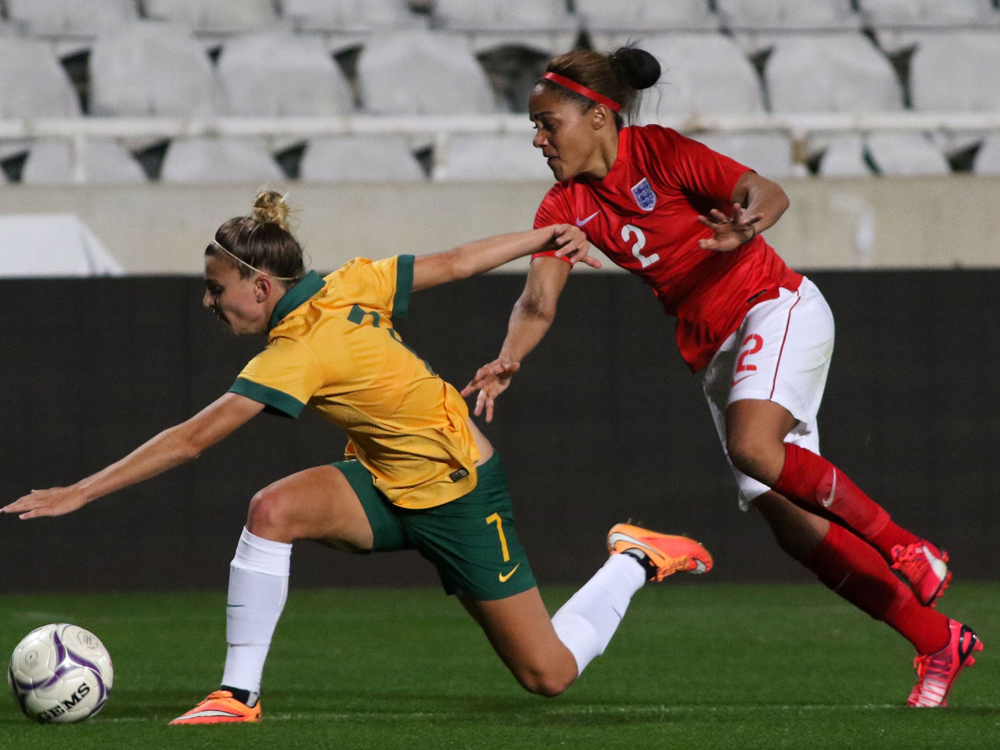 Alex Scott (right) battles with Australia's Stephanie Catley