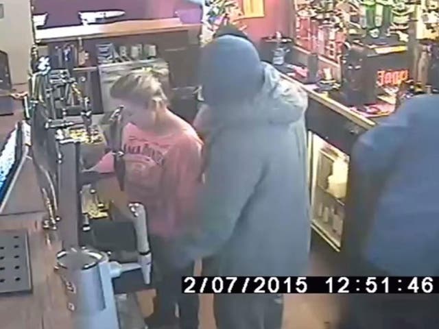 Cctv Footage Shows Armed Robbers Threaten Pub Staff With Machete Then