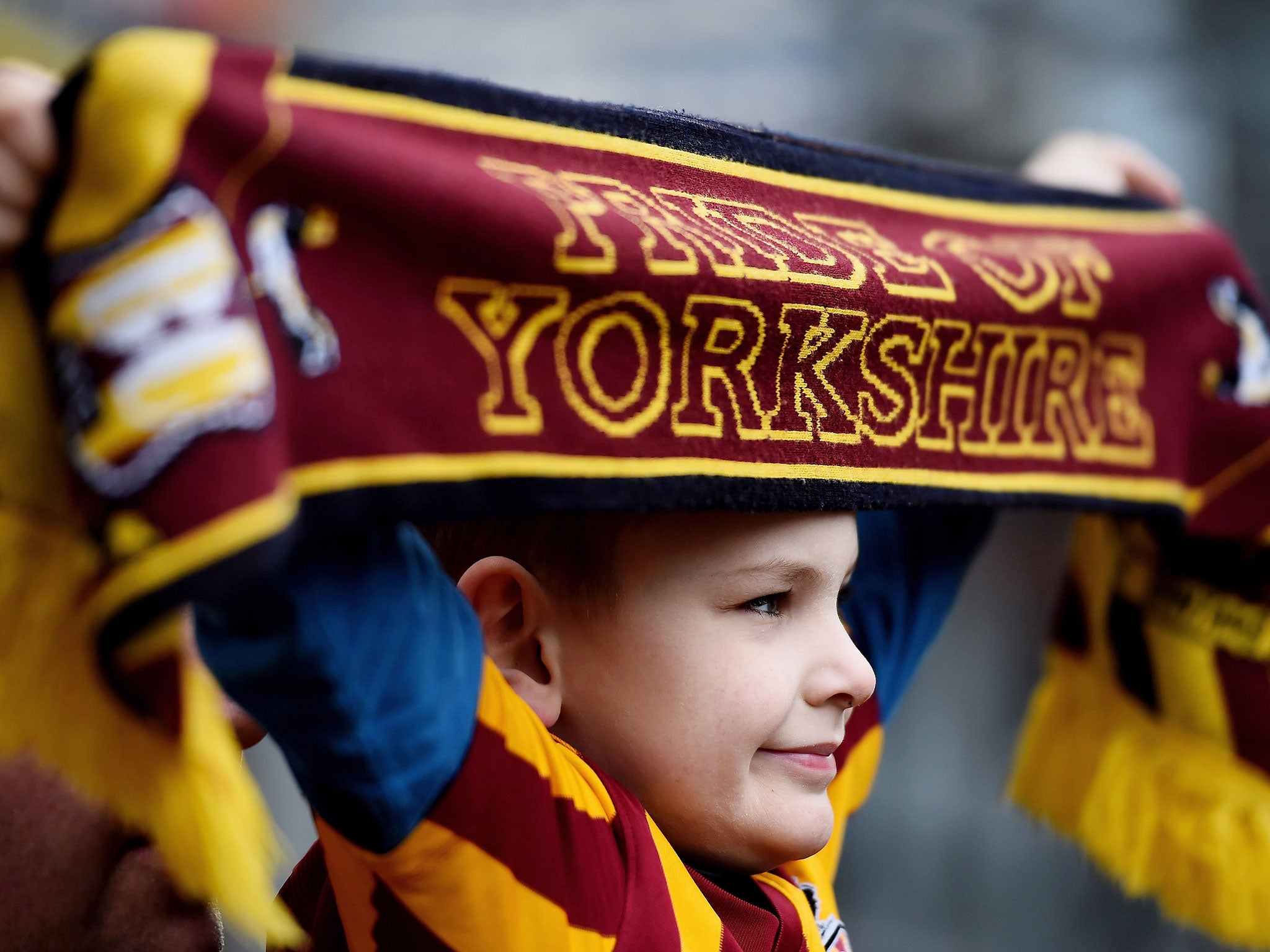 A young Bradford fan shows his support for the team