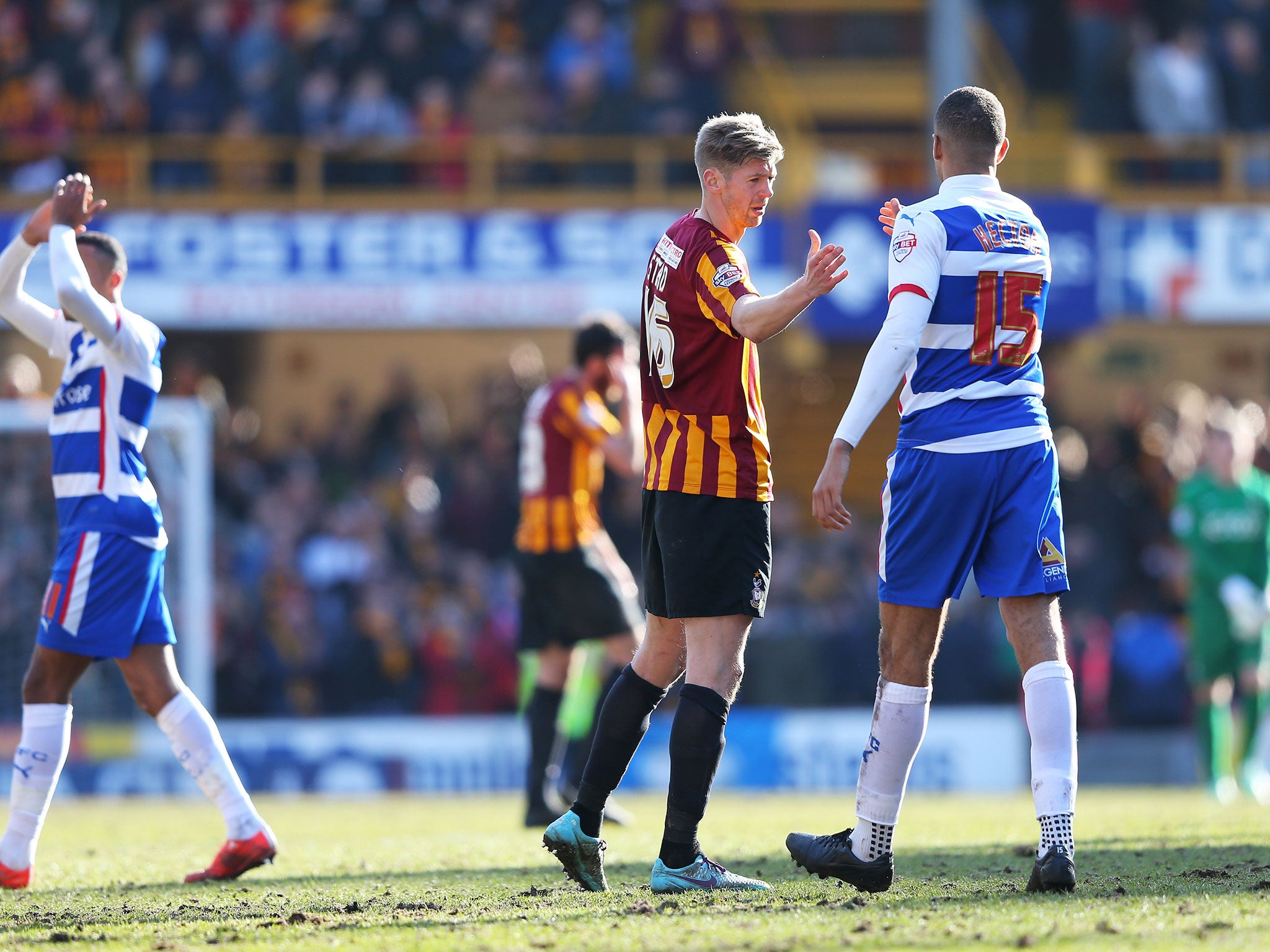 Jon Stead shakes hands with Michael Hector at the final whistle