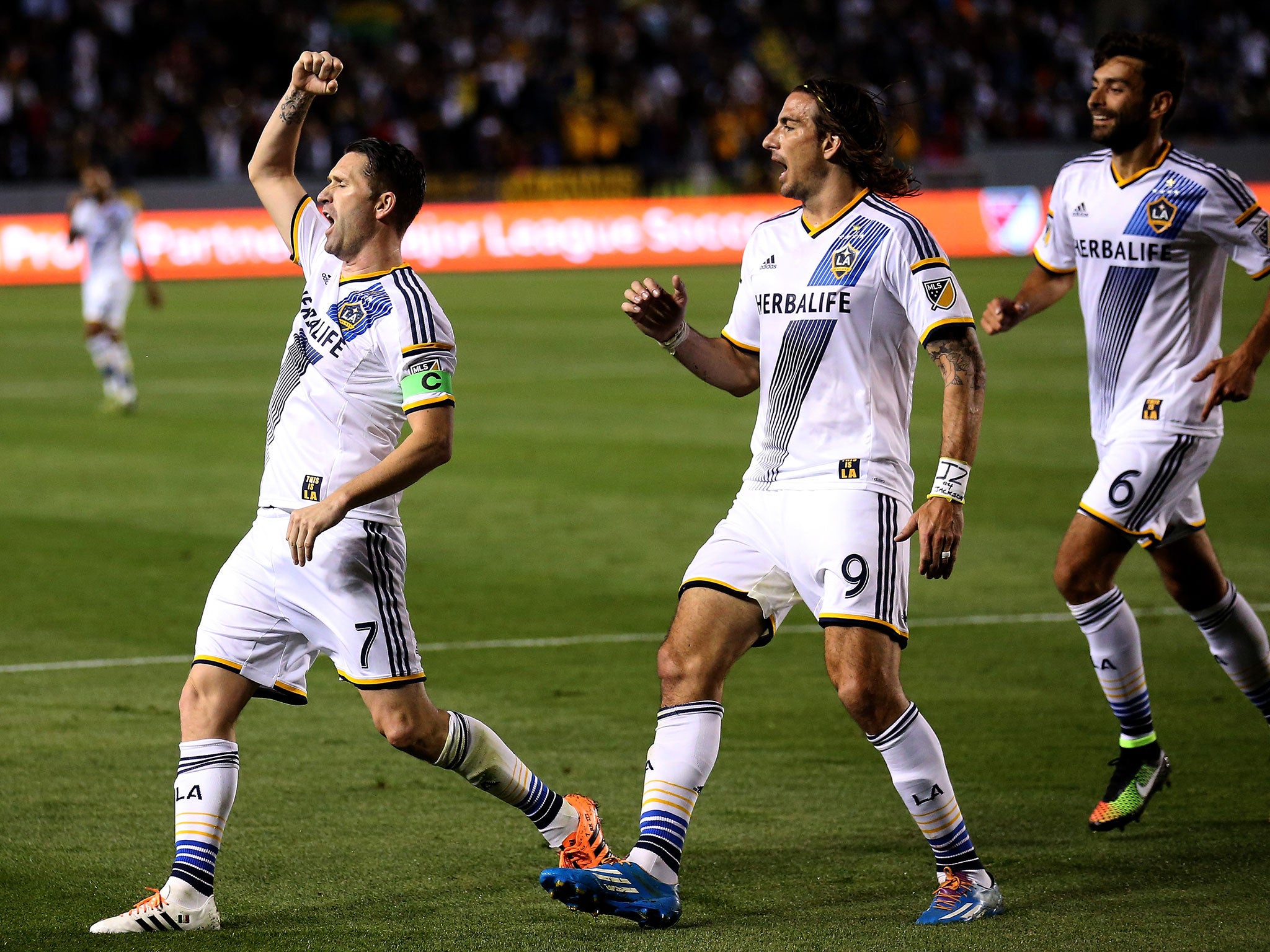 Robbie Keane celebrates scoring LA Galaxy's second goal against Chicago Fire on Friday
