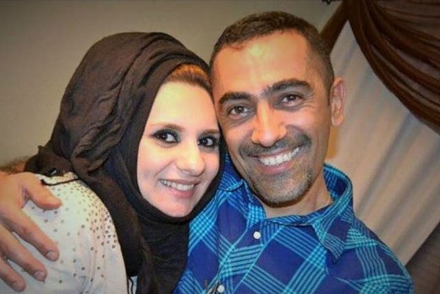 Ahmed Al-Jumaili, pictured with his wife, was shot and killed while he was watching snow fall for the first time 