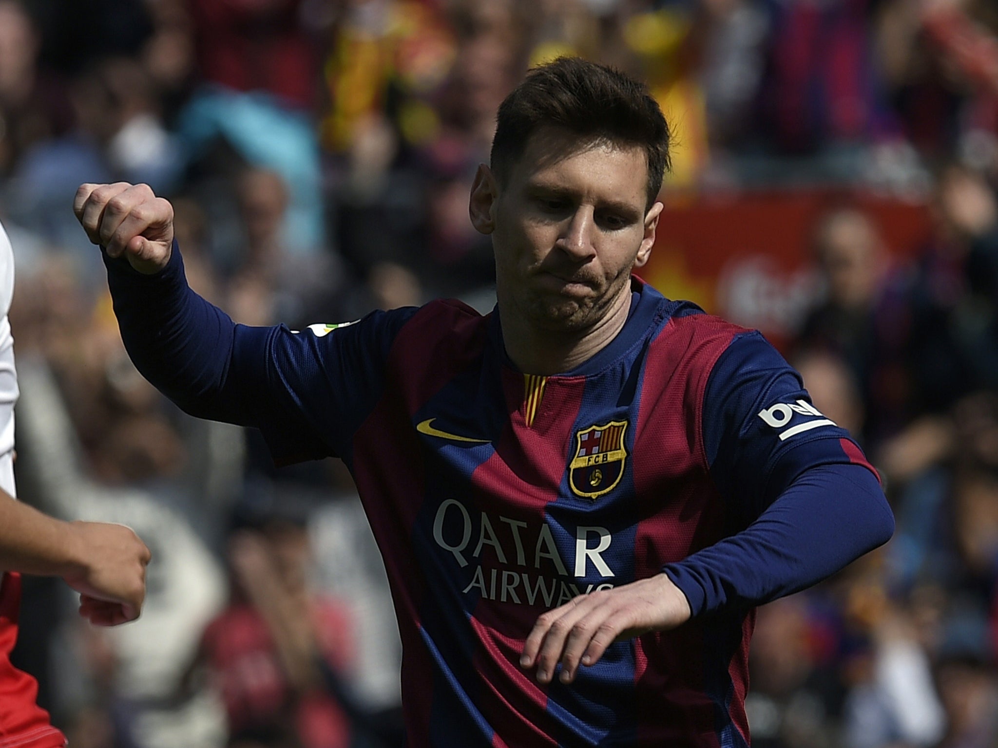 Barcelona's Argentinian forward Lionel Messi celebrates after scoring during the Spanish league football match FC Barcelona vs Rayo Vallecano